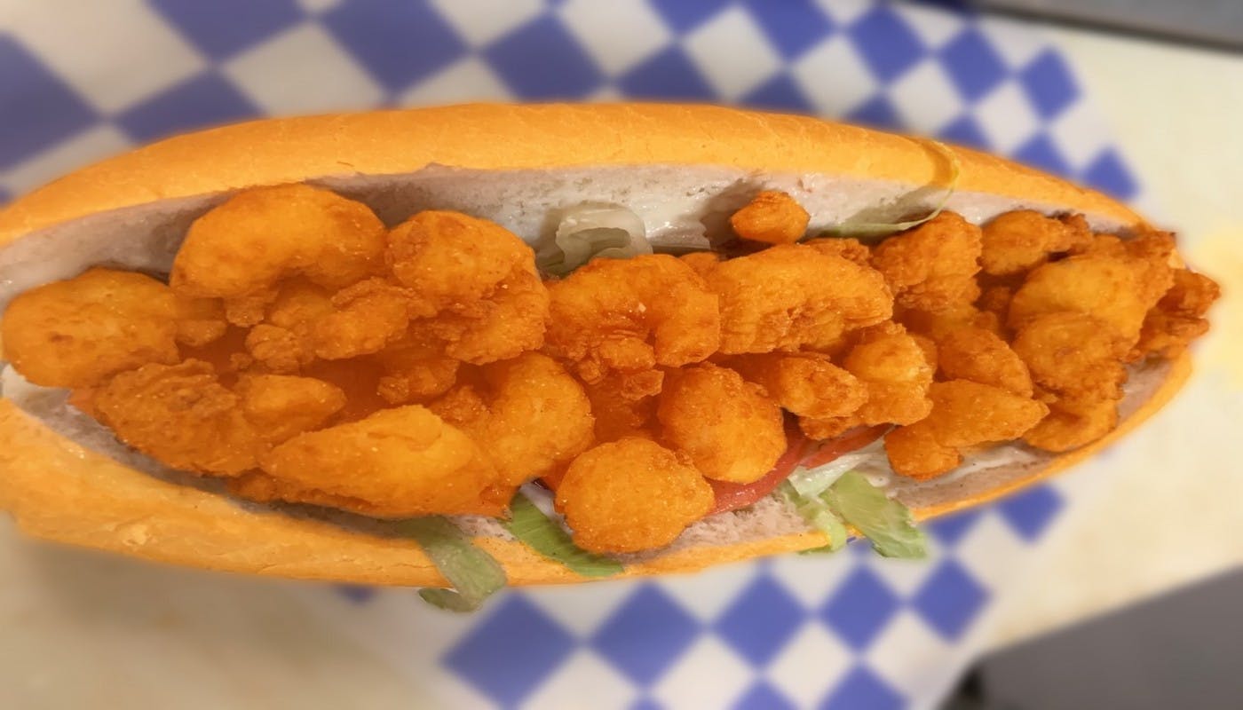 Order Popcorn Shrimp Po Boy Sub - Small 8" food online from Village Pizza and Seafood store, Pasadena on bringmethat.com
