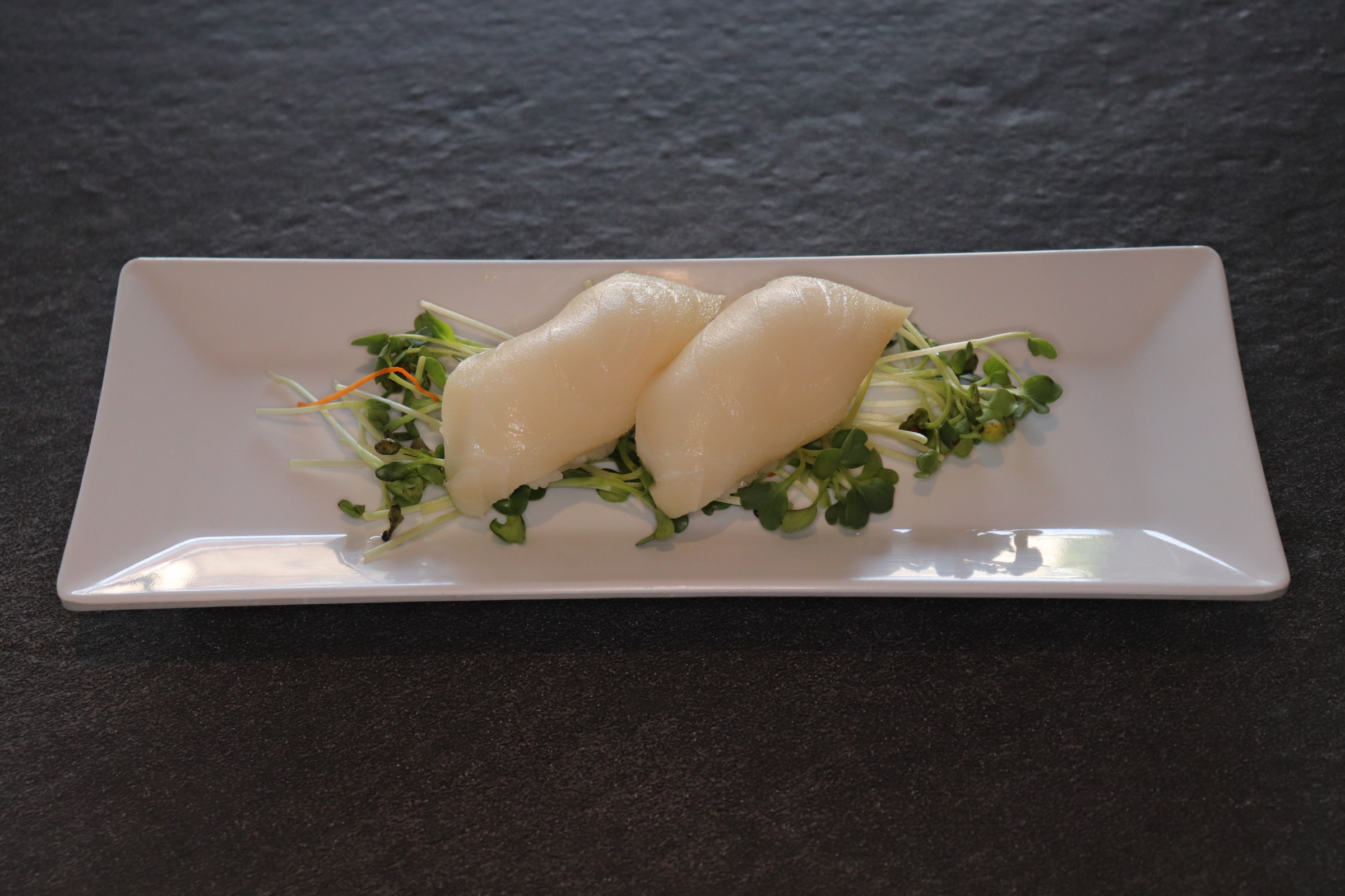 Order Super White Tuna Nigiri food online from Toshiko Ramen And Sushi Bar store, Fresno on bringmethat.com