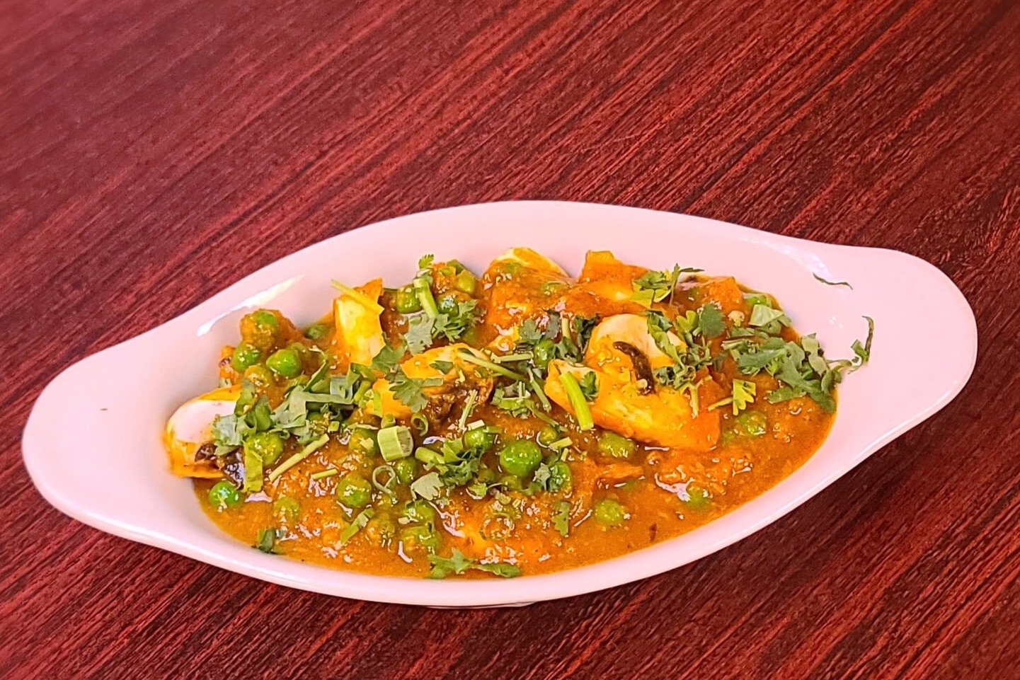Order Mushroom Matar food online from Om Indian Cuisine store, San Francisco on bringmethat.com