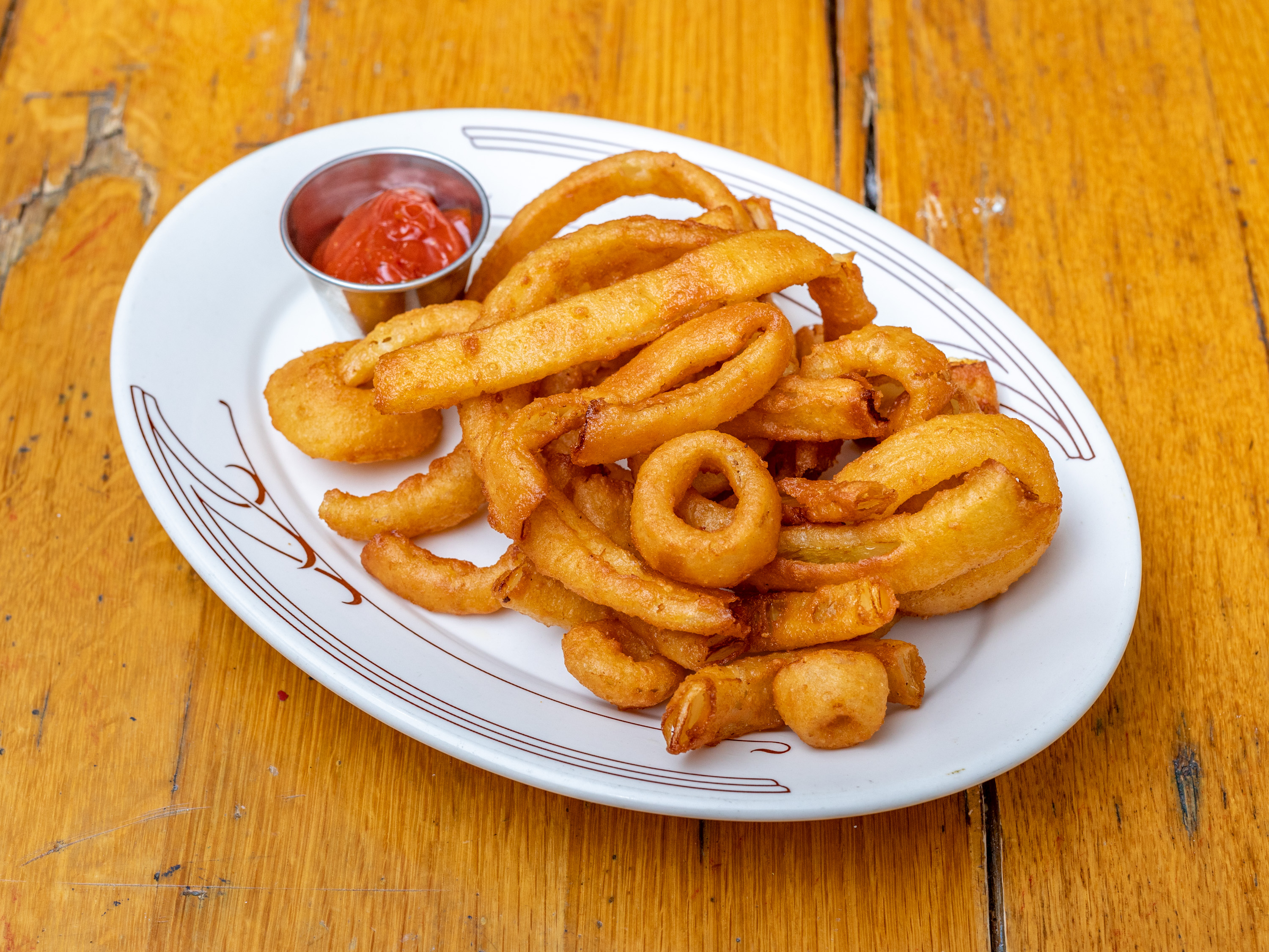 Order ONIONS RINGS food online from Thiago's Restaurant store, Chicago on bringmethat.com