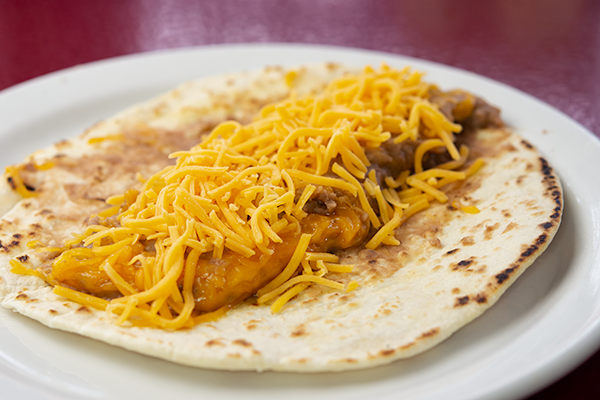 Order Bean and Cheese Taco food online from The Hut Diner store, San Antonio on bringmethat.com