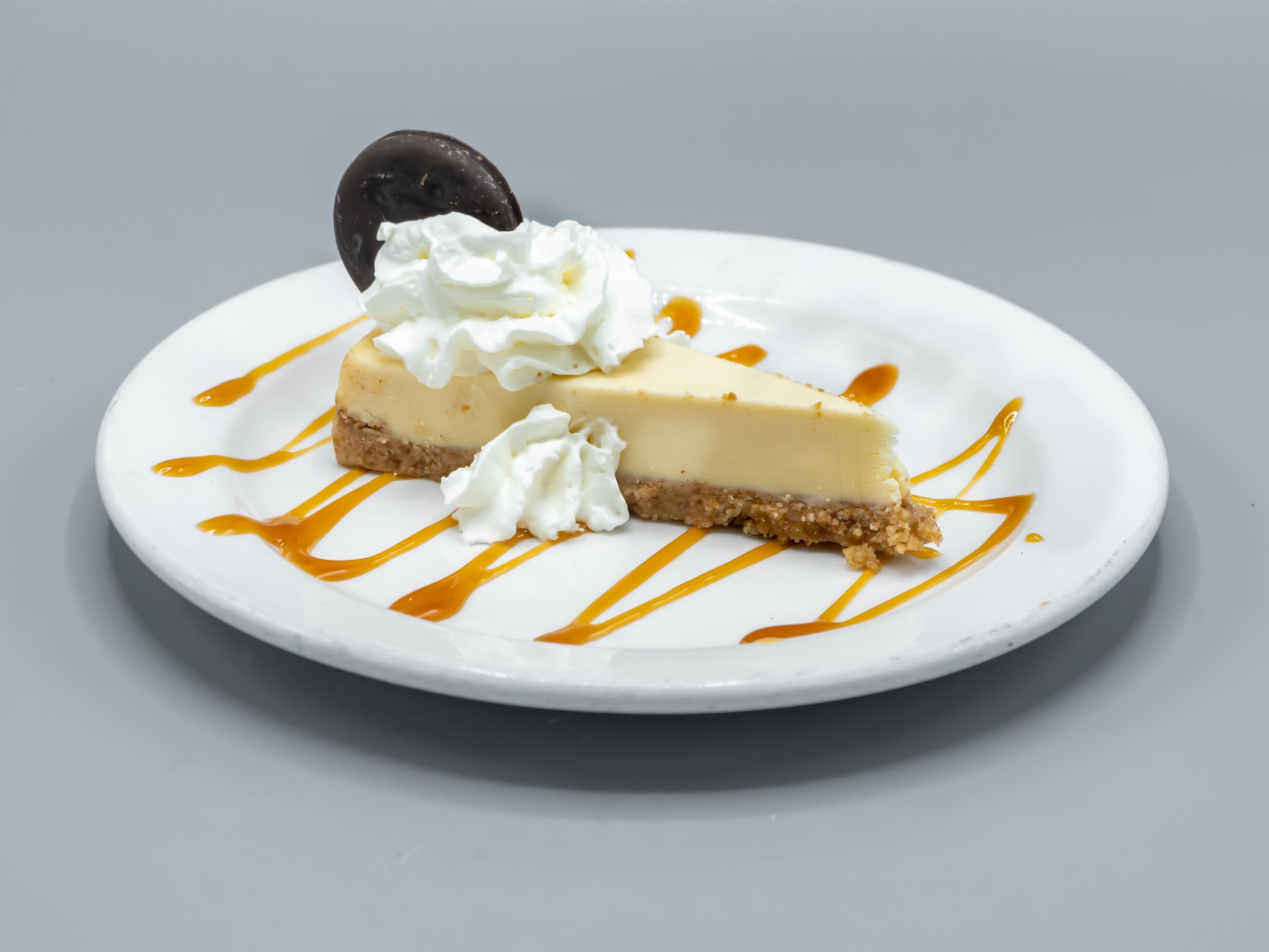 Order Devine Cheesecake food online from Freddie Beach Bar & Restaurant store, Arlington on bringmethat.com