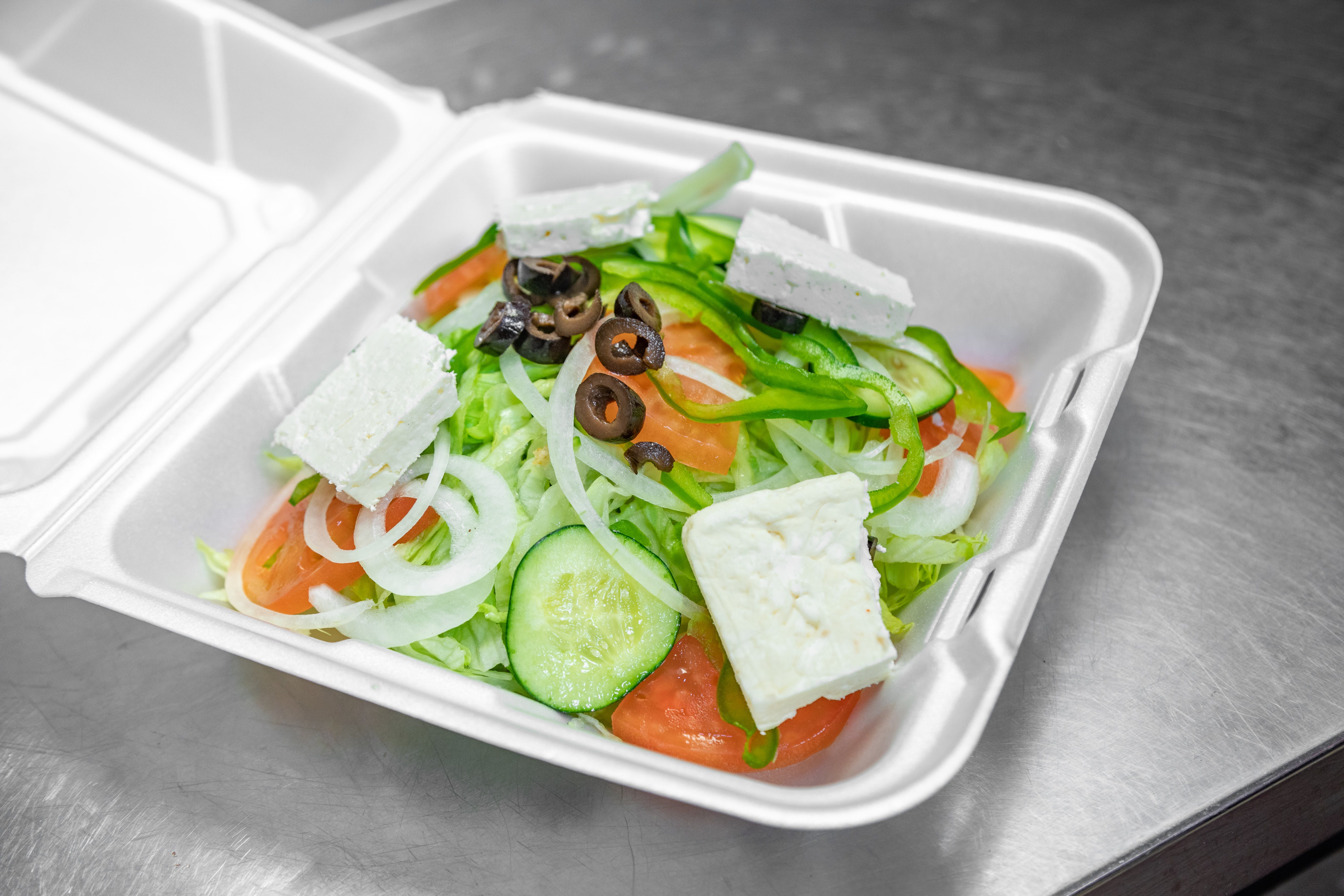 Order Greek Salad - Salad food online from Campus Pizza store, Hartford on bringmethat.com
