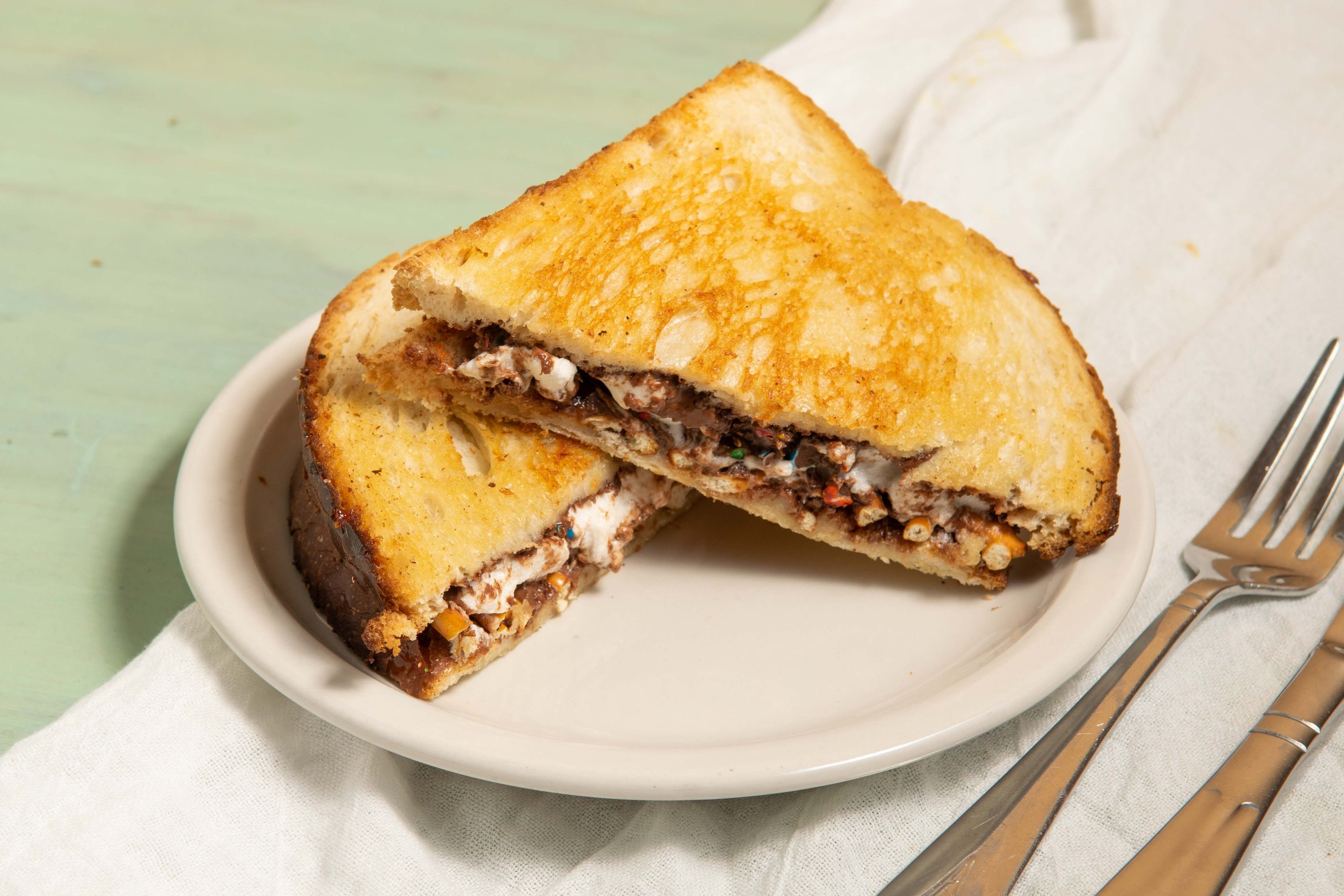 Order Regular Price - Nutella Panini food online from Cheesy Chick store, Williamsville on bringmethat.com