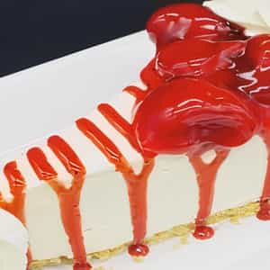 Order Strawberry Delight Cheesecake food online from 2cheesecakecuties store, Austin on bringmethat.com