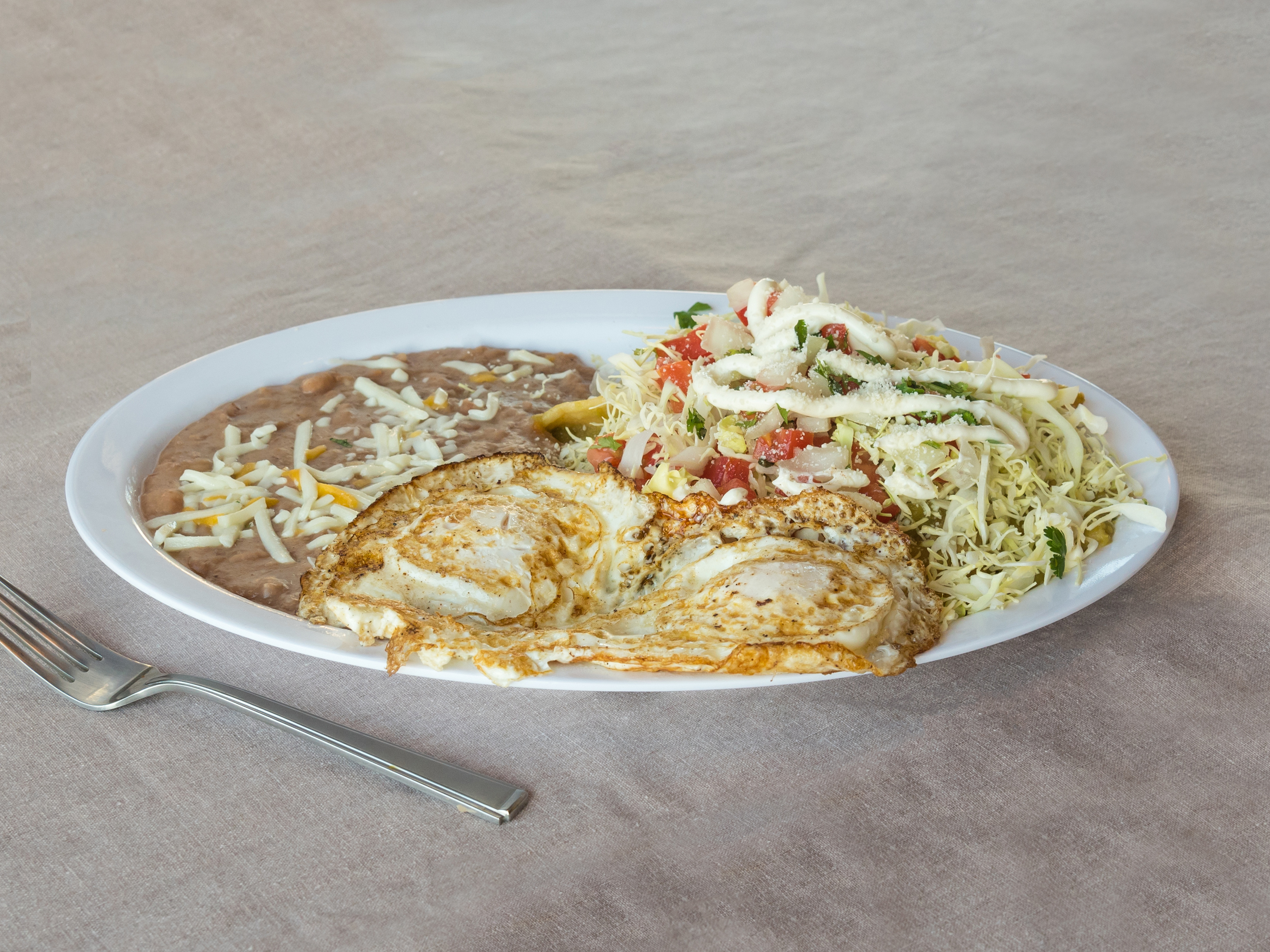 Order Chilaquiles food online from Mamis Mexican Grill store, Eugene on bringmethat.com