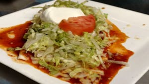 Order 117. Burritos Deluxe food online from La Tolteca store, Williamsburg on bringmethat.com