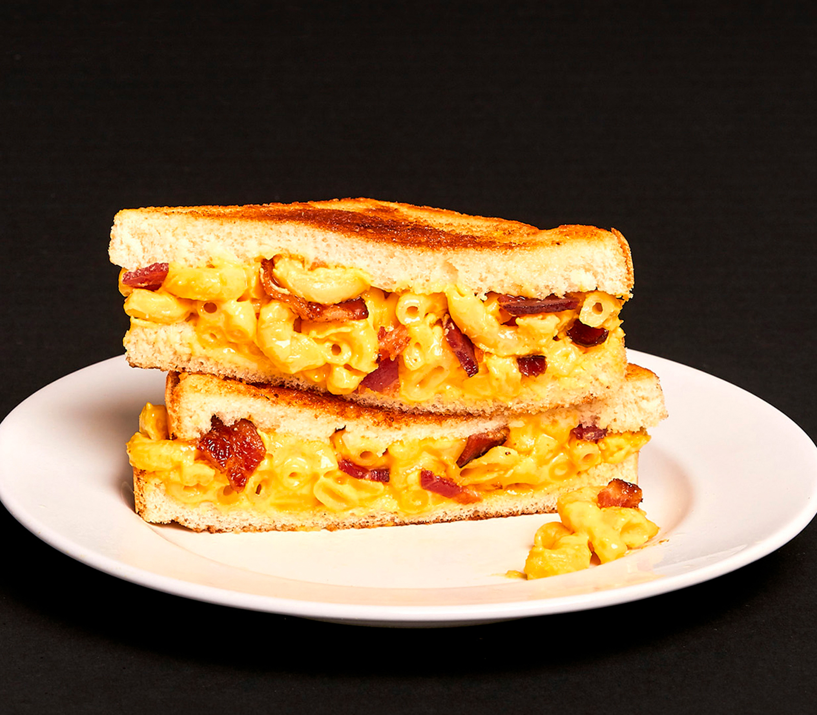 Order Bacon Mac and Cheese Melt Sandwich food online from The Mac Scientist store, Baton Rouge on bringmethat.com