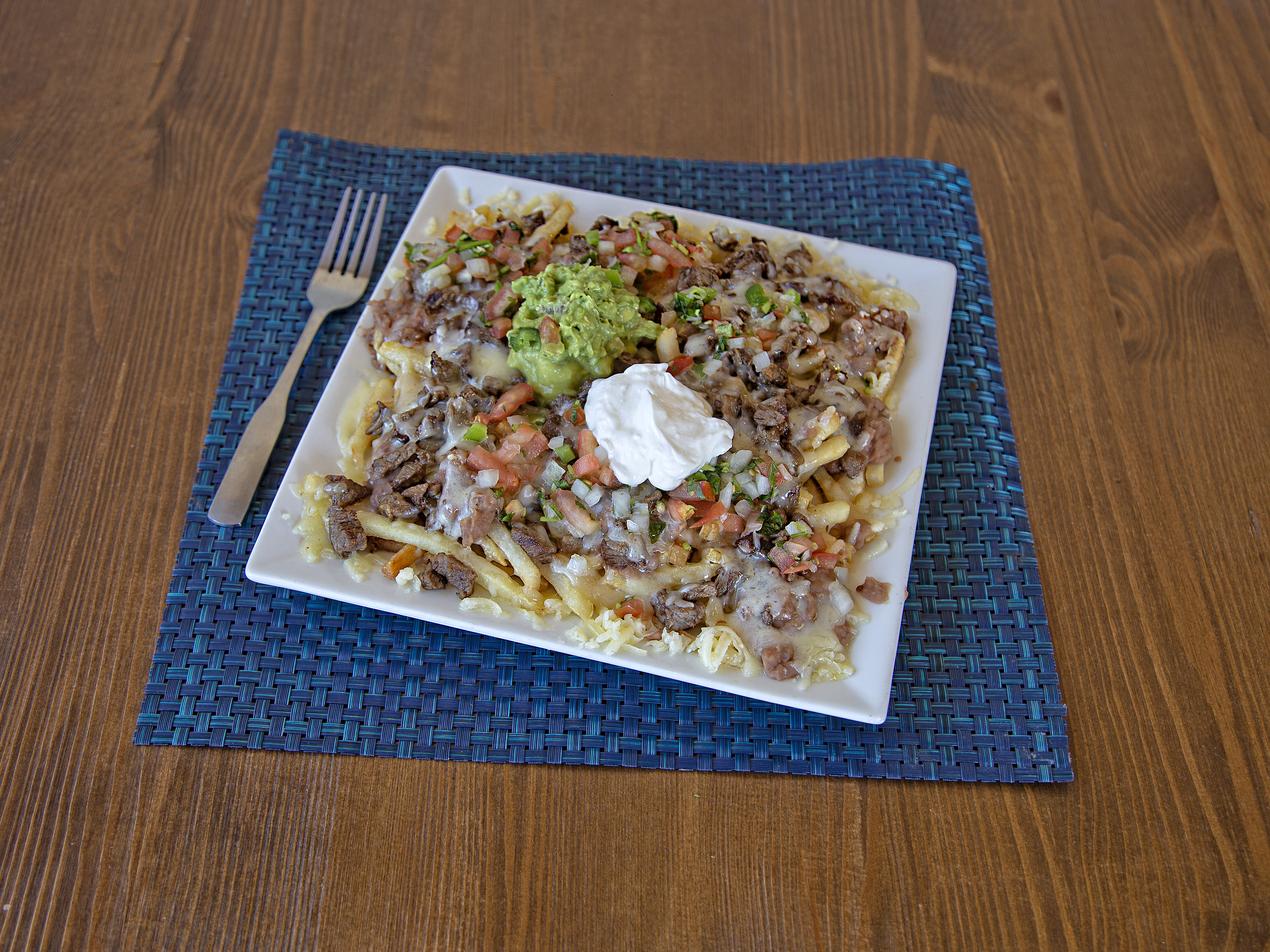 Order Regular Carne Asada Fries (Lrg not available for delivery) food online from Ruben Mariscos & Mexican Grill store, Apple Valley on bringmethat.com