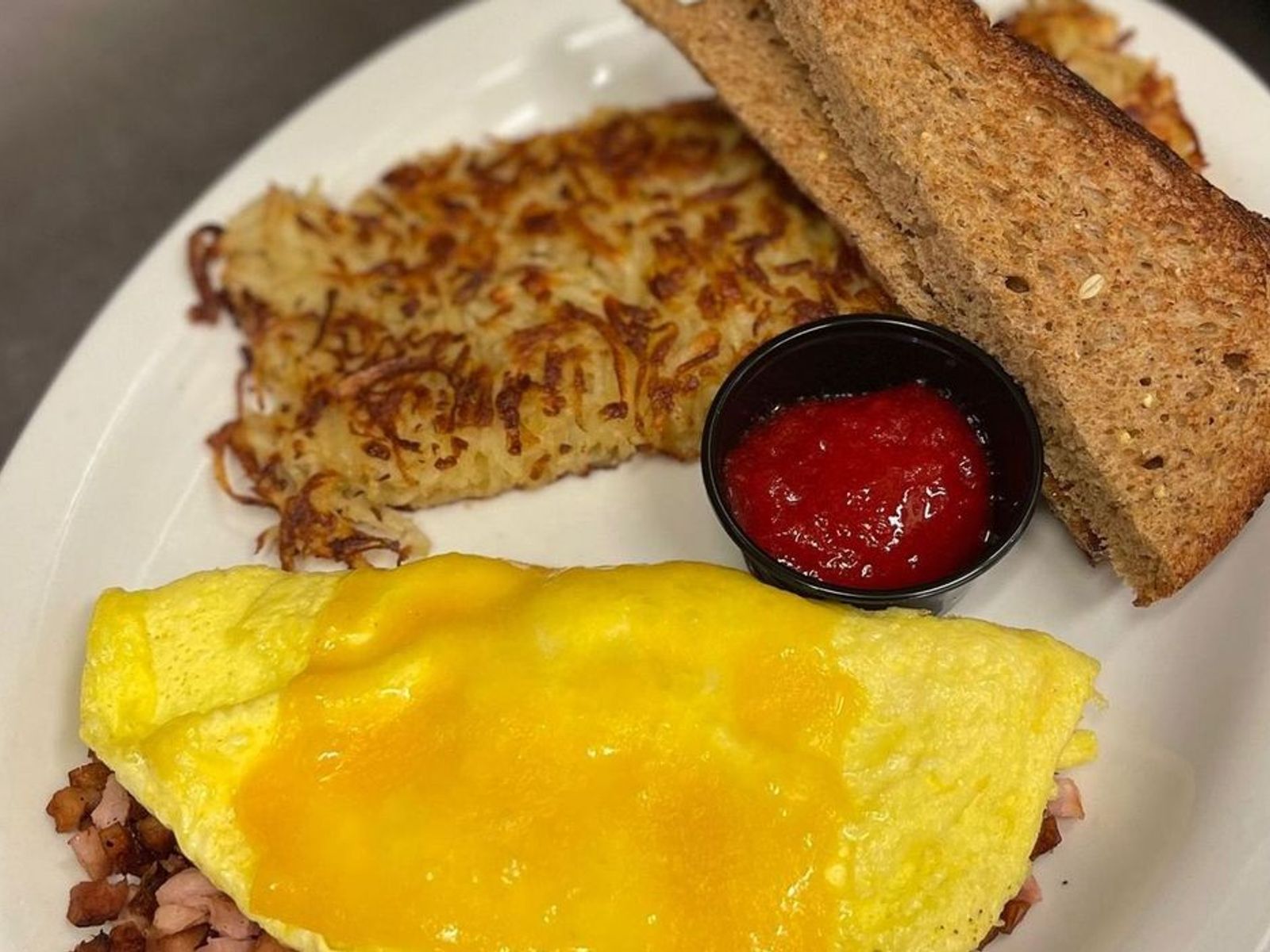 Order Ham Omelet - OO food online from Biscuits Cafe store, Chandler on bringmethat.com