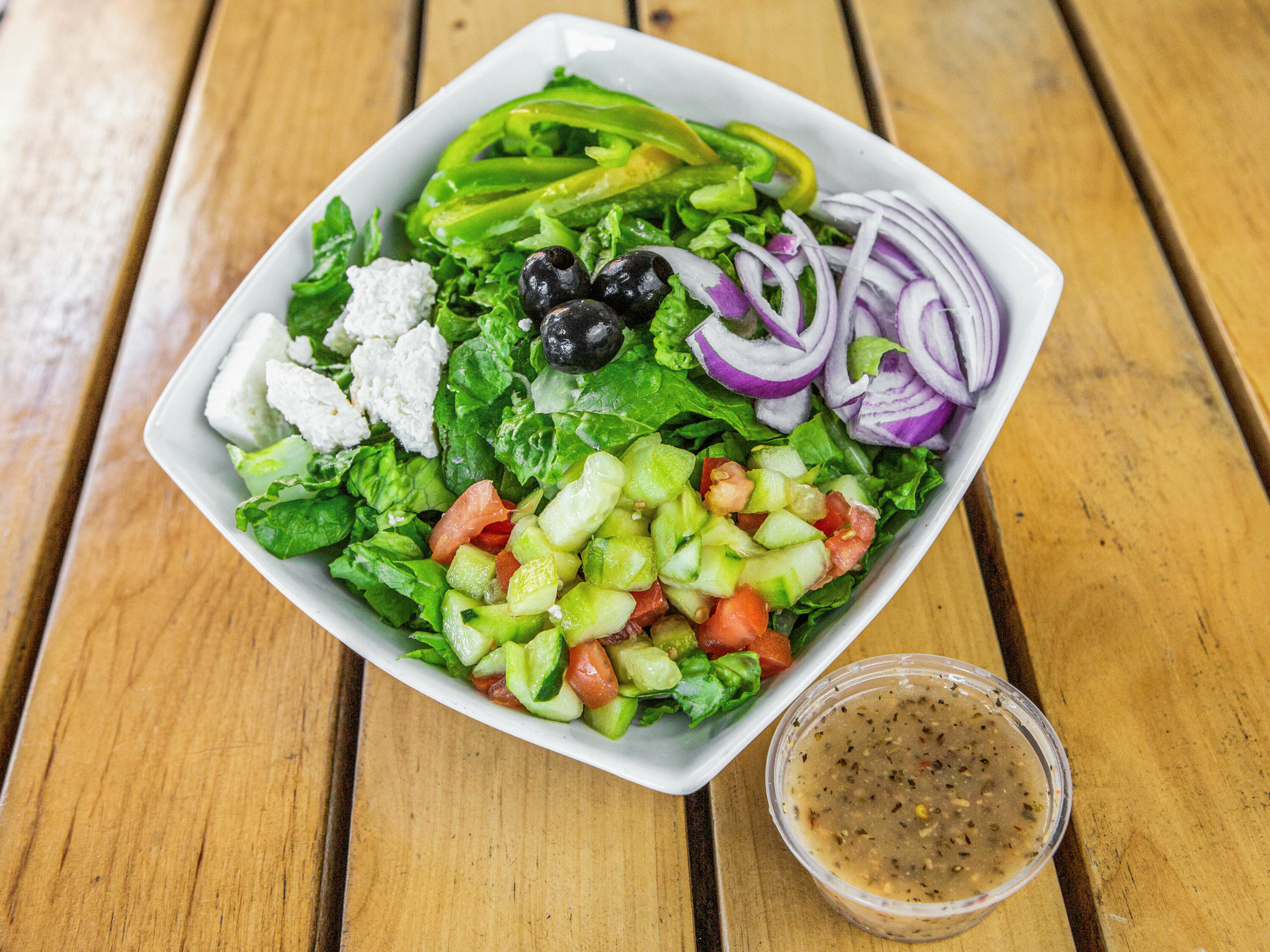 Order Greek Salad food online from The Mediterranean Kitchen store, Los Angeles on bringmethat.com