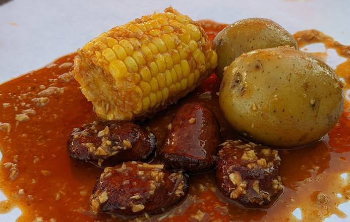 Order Make It Awesome (1 corn, 2 Potatoes, 4 Sausages) food online from Stinkin Crawfish store, Gardena on bringmethat.com