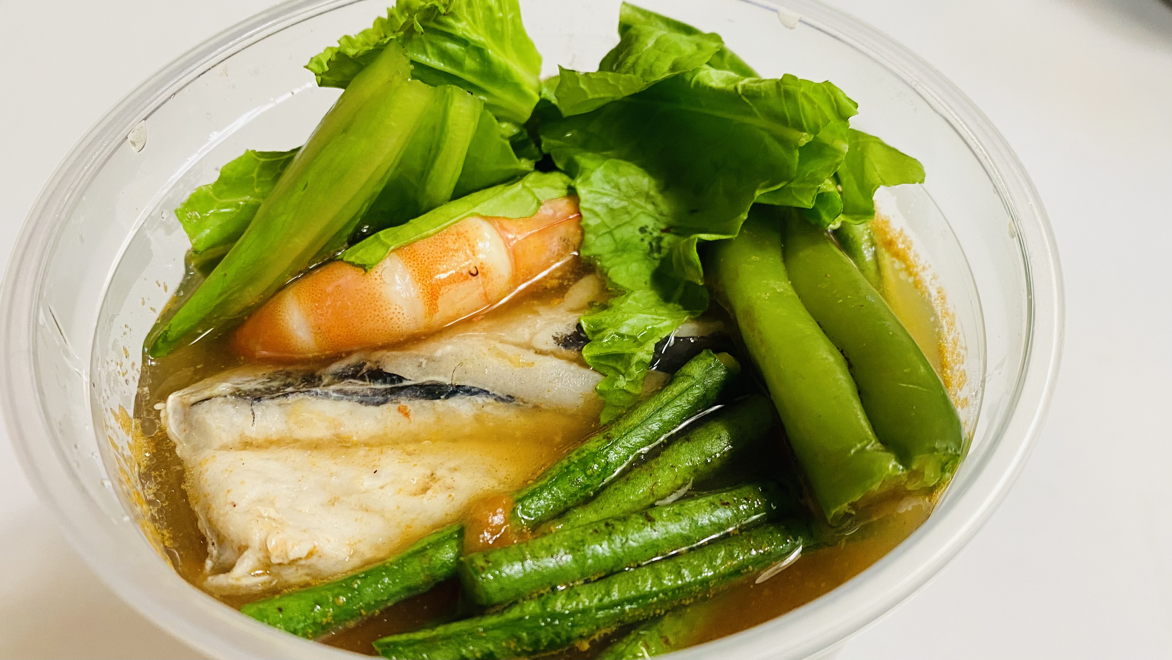 Order 32 oz. Seafood Sinigang Soup food online from Kusinera store, San Lorenzo on bringmethat.com