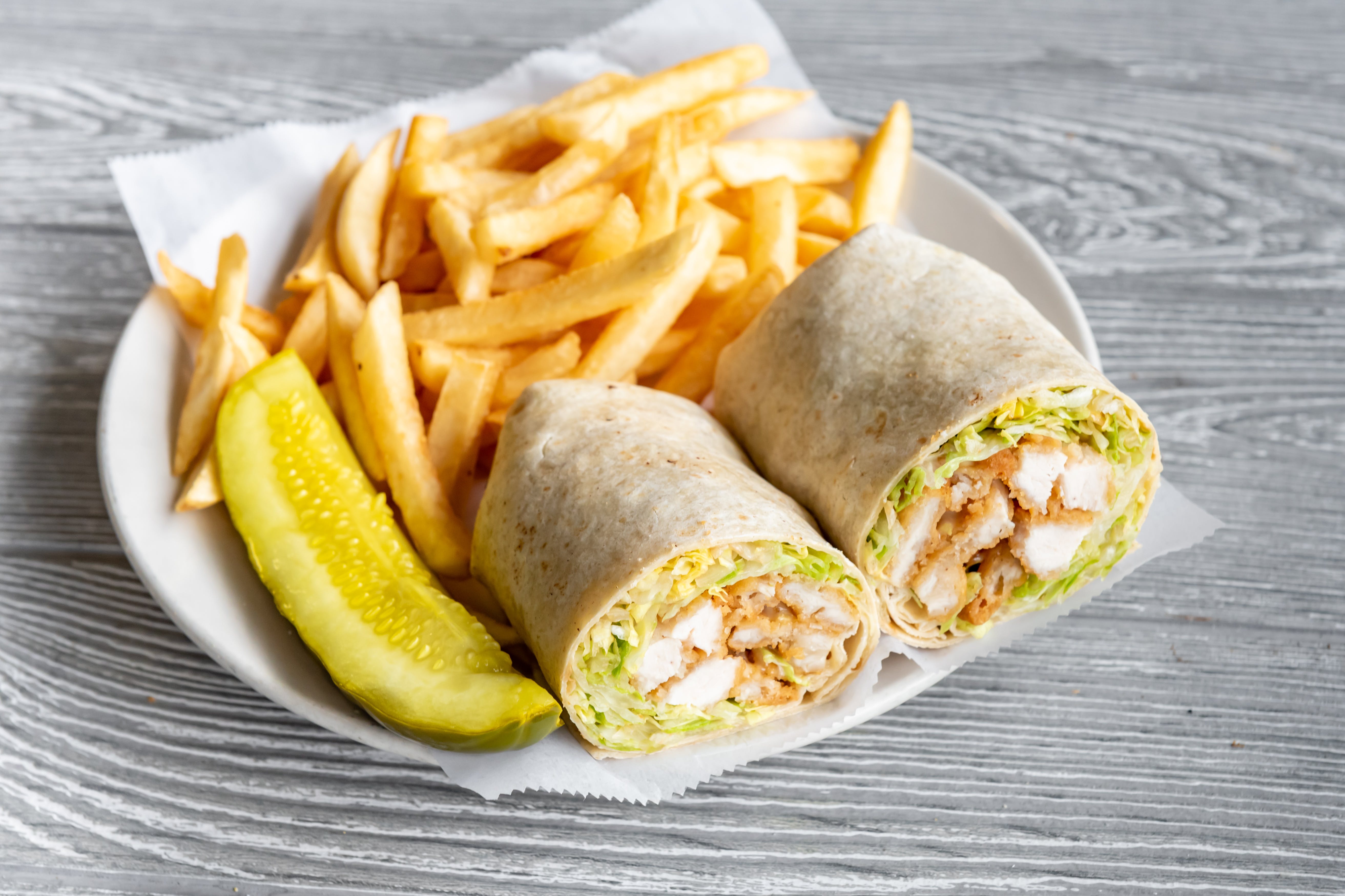 Order Chicken Tender Wrap - Wrap food online from Pronto Pizza store, Merchantville on bringmethat.com