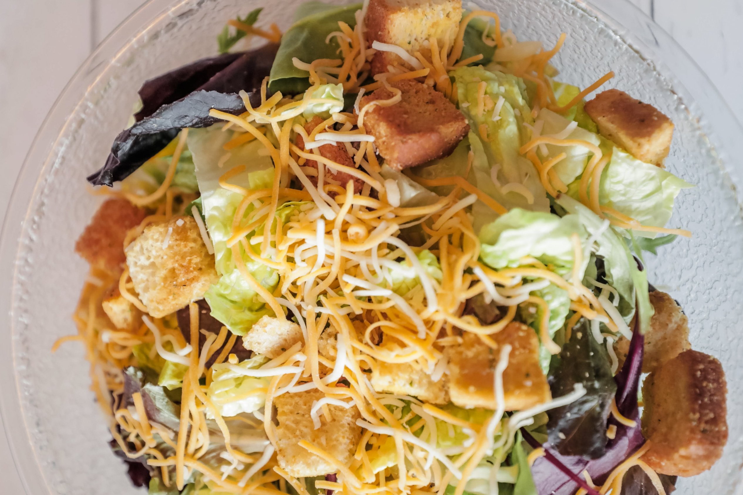 Order Caesar Salad food online from Hook & Reel Cajun Seafood store, Country Club Hills on bringmethat.com
