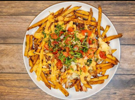 Order Loaded Fries food online from Flagship Tavern store, Chicago on bringmethat.com