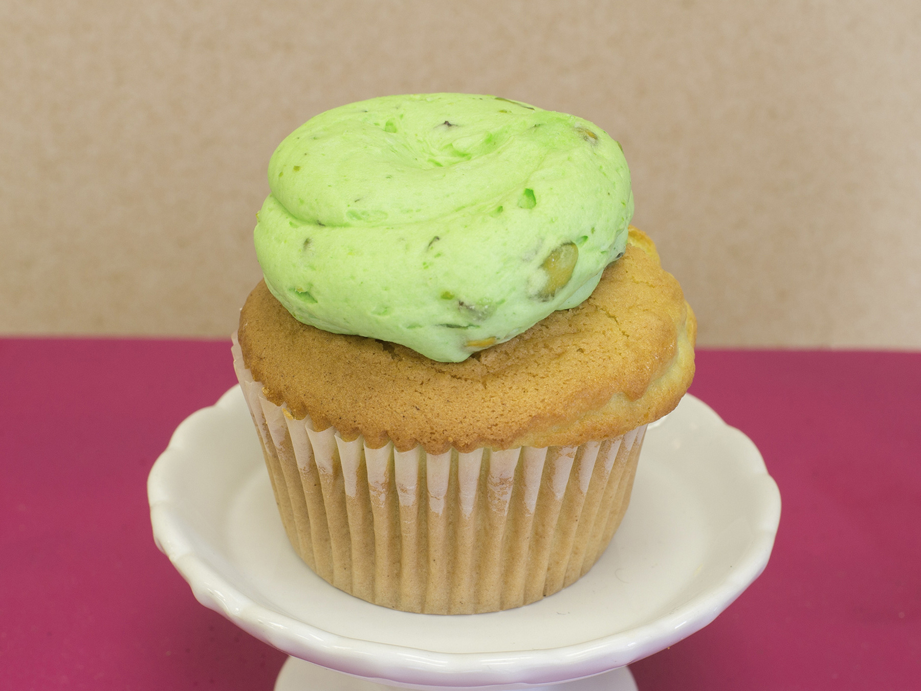 Order Pistachio Nut Cupcake-Contains Nuts food online from Livay Sweet Shop store, Plainfield on bringmethat.com