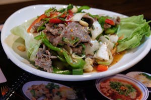 Order 16. Beef Salad food online from Miko Thai Kitchen store, Hudson on bringmethat.com