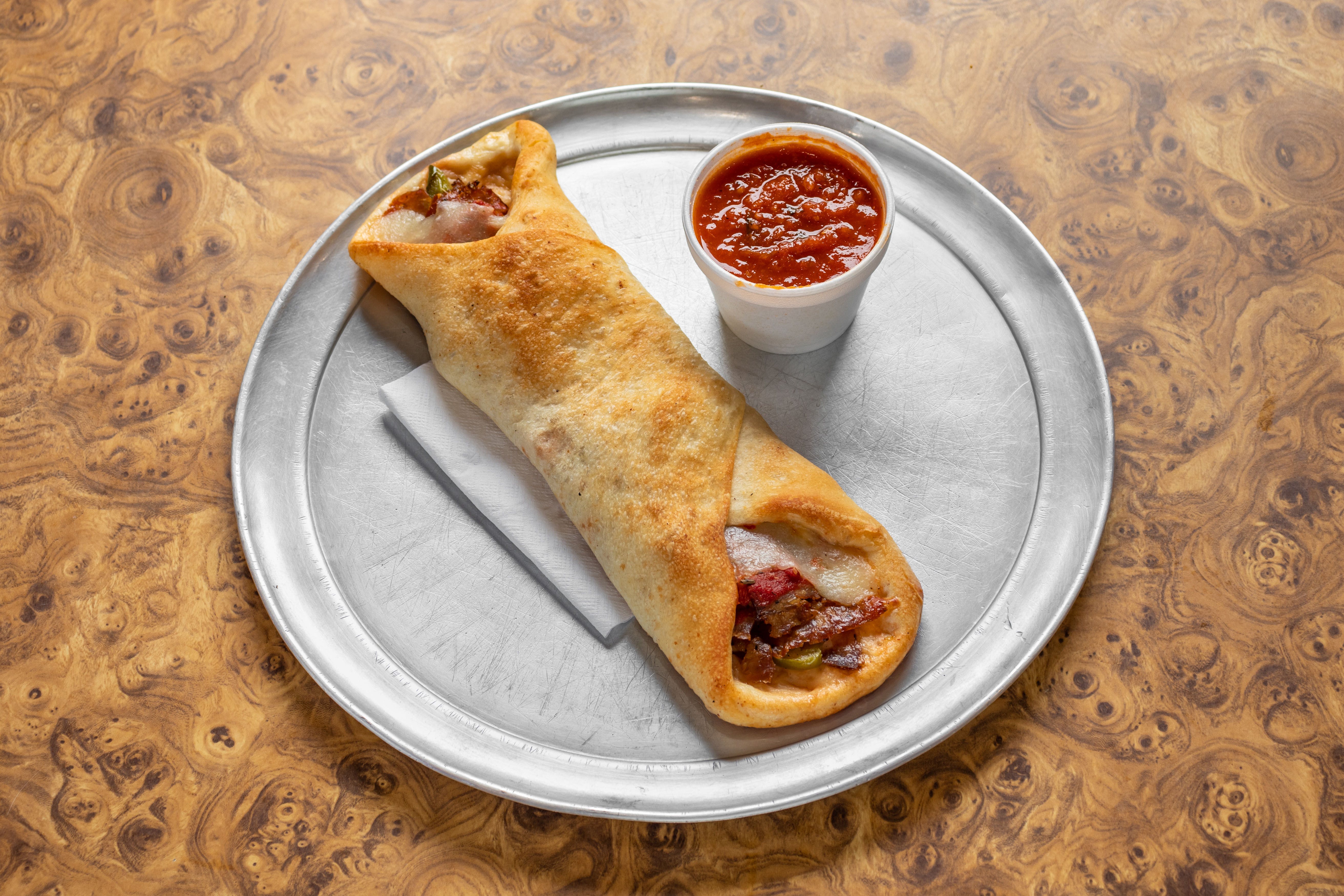 Order Sausage & Peppers Roll - Roll food online from Primos Pizza store, New Windsor on bringmethat.com
