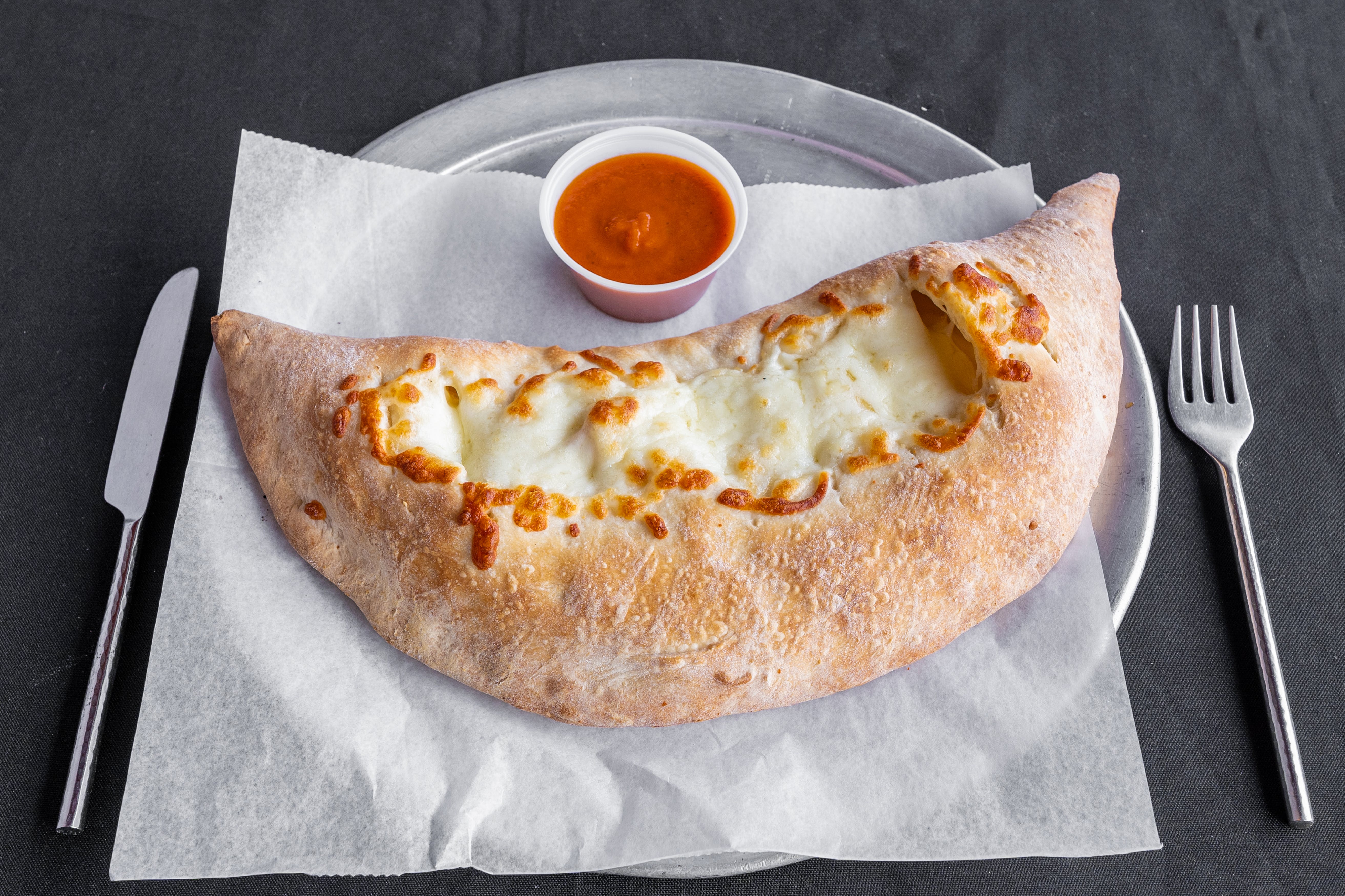 Order Italian Stromboli - Medium food online from Abington Pizza store, Glenside on bringmethat.com
