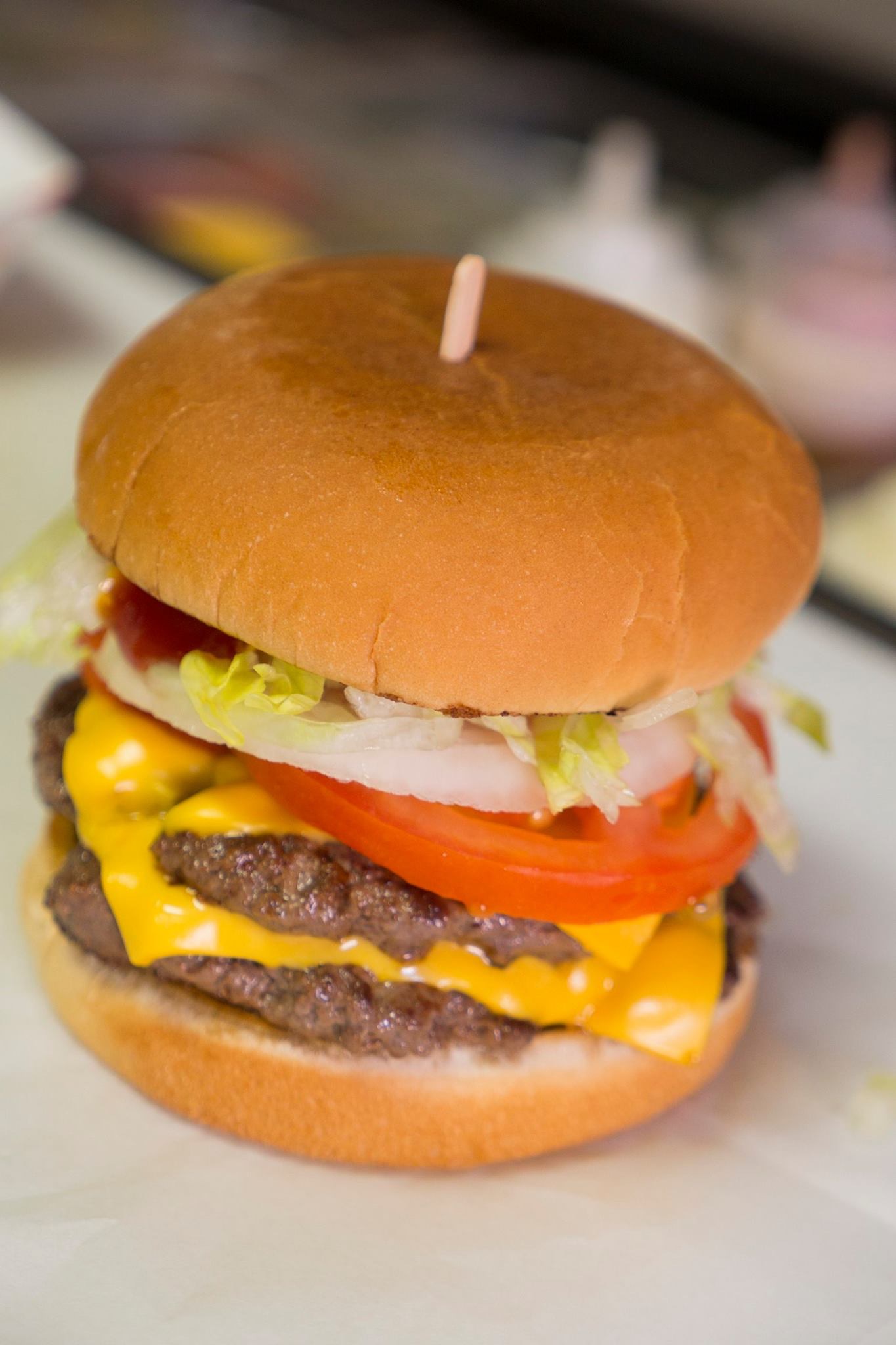 Order Double Cheeseburger food online from Burgers, Fish & Fries store, La Mesa on bringmethat.com