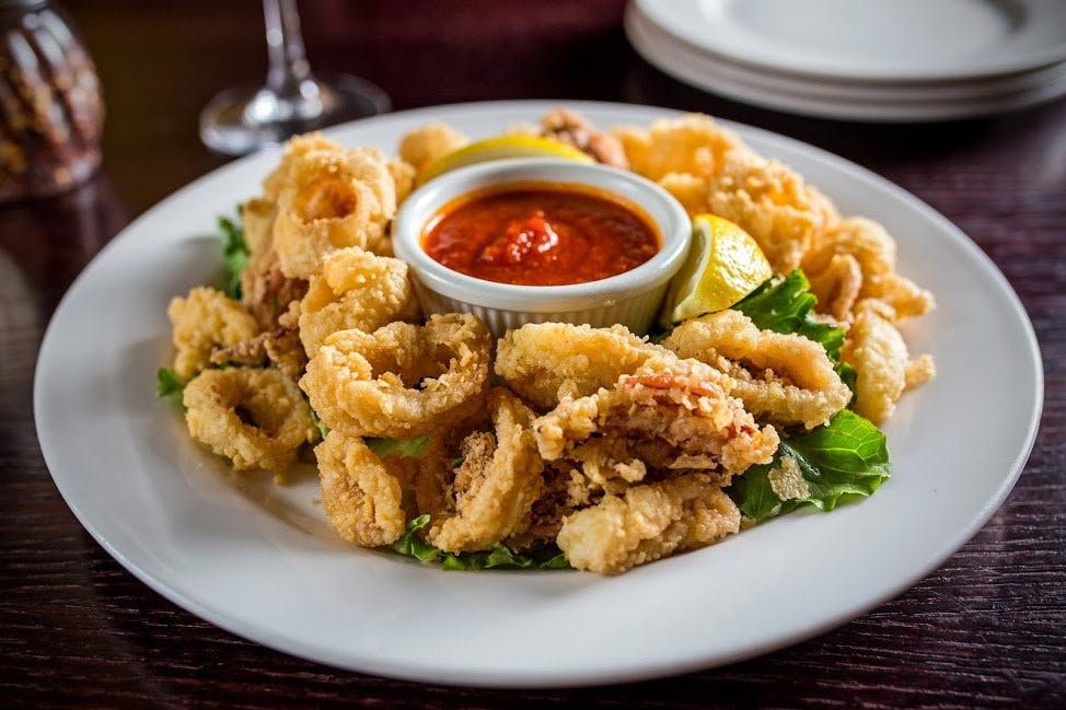 Order Calamari Fritti - Appetizer food online from Connies Pizza By The Pier store, Chicago on bringmethat.com