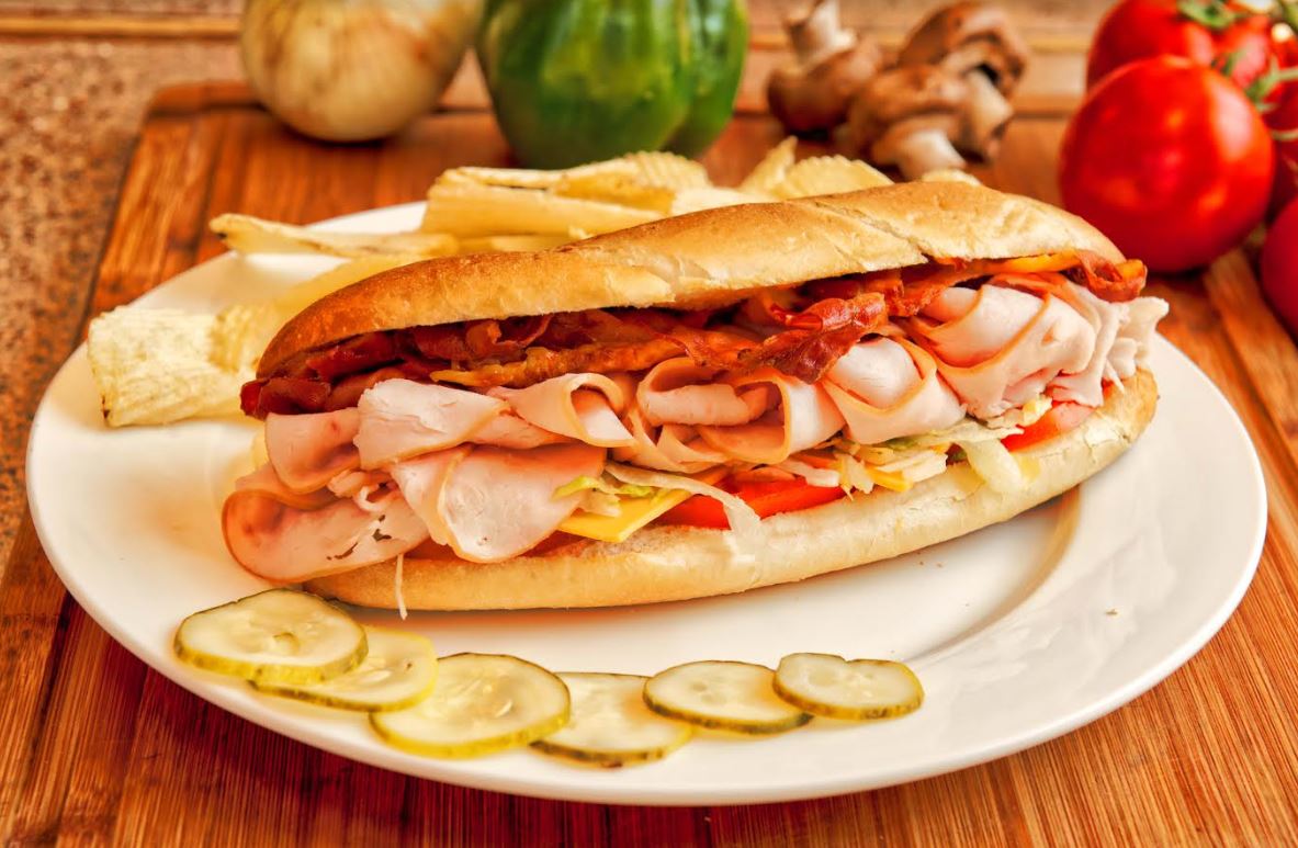 Order Turkey Club Toasted Slammer food online from Pat Pizzeria store, Ithaca on bringmethat.com