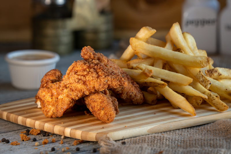 Order Kid's Chicken Tenders with Fries food online from The Butcher Grille store, Dearborn on bringmethat.com
