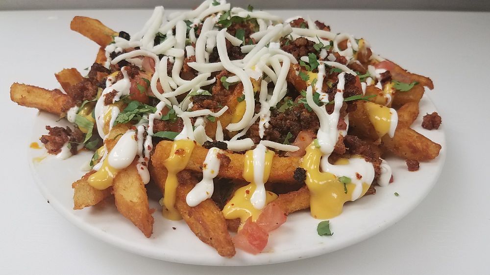 Order Loaded Homemade Fries food online from Tony Tacos store, Normal on bringmethat.com