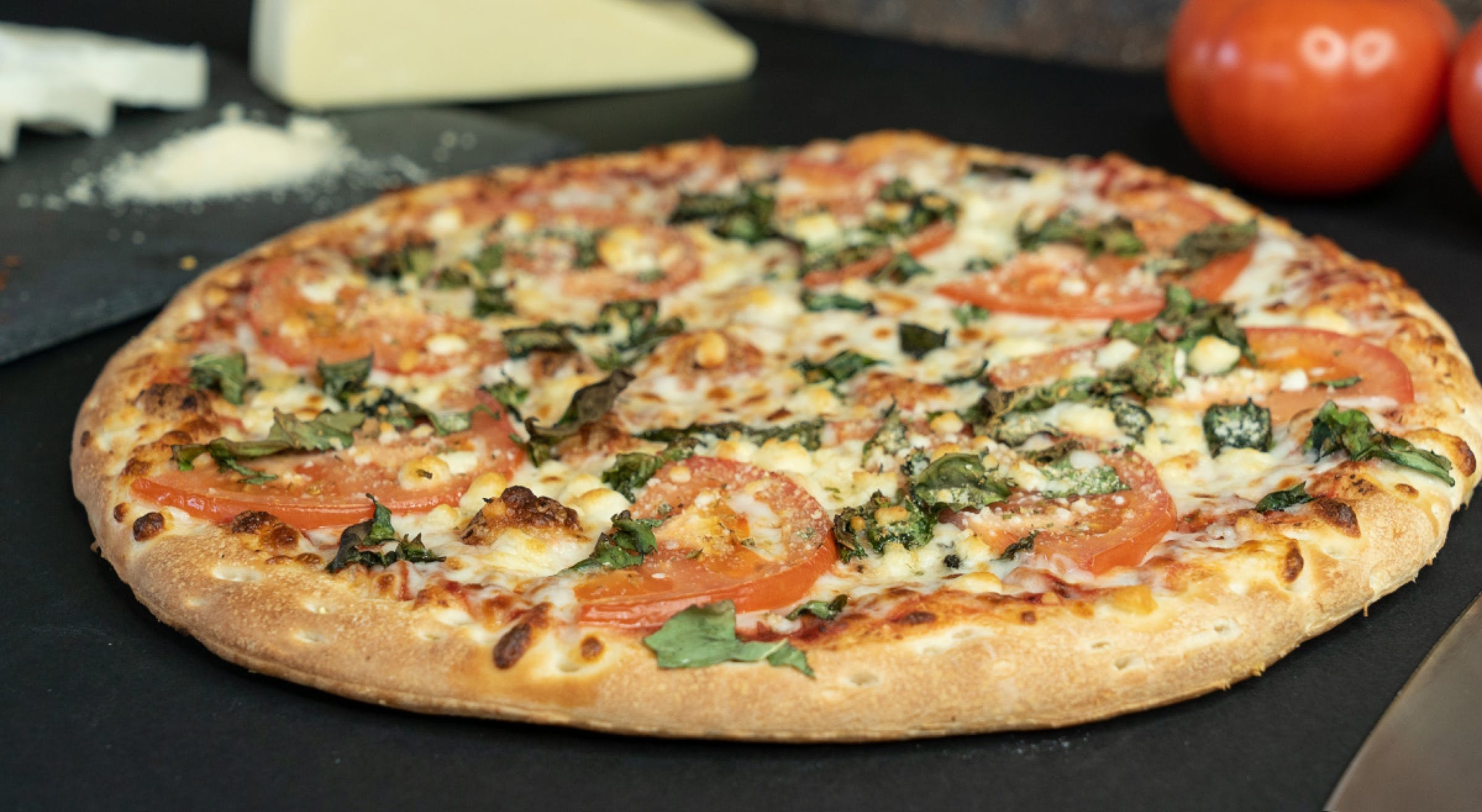 Order Margherita Pizza - Medium 12'' food online from Tenney's Pizza store, Saratoga Springs on bringmethat.com