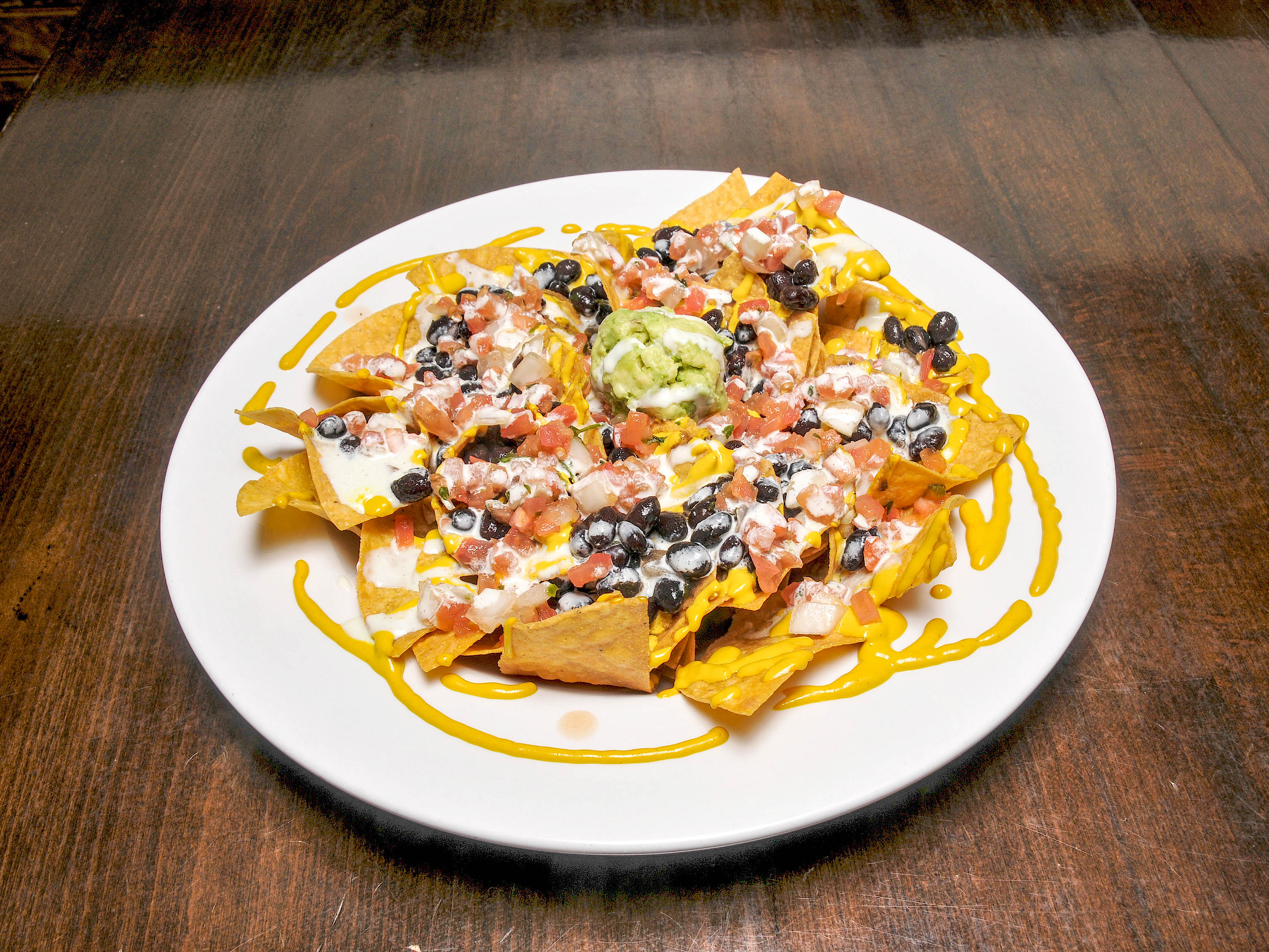 Order Loaded Nachos food online from Earth To Us store, Durham on bringmethat.com