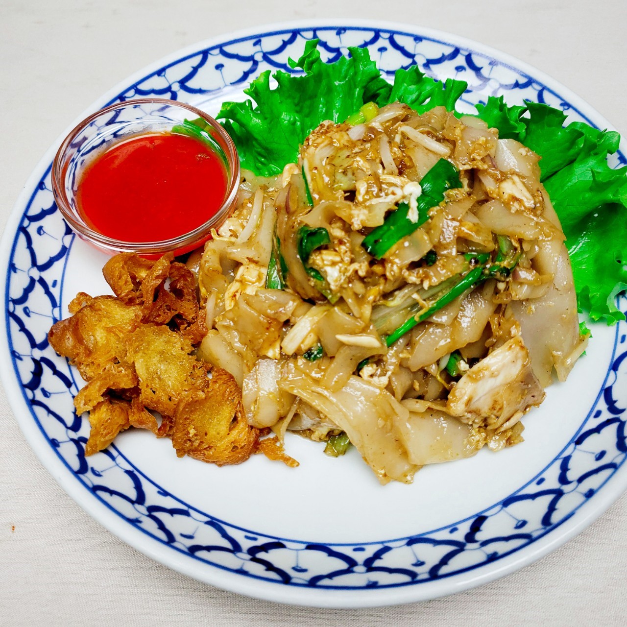 Order Kua Gai food online from Thai Villa store, New York on bringmethat.com