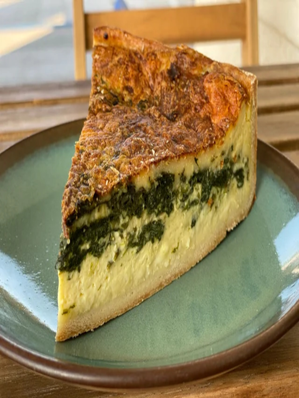 Order Spinach and Cheese Quiche food online from Chaupain Bakery store, Laguna Hills on bringmethat.com