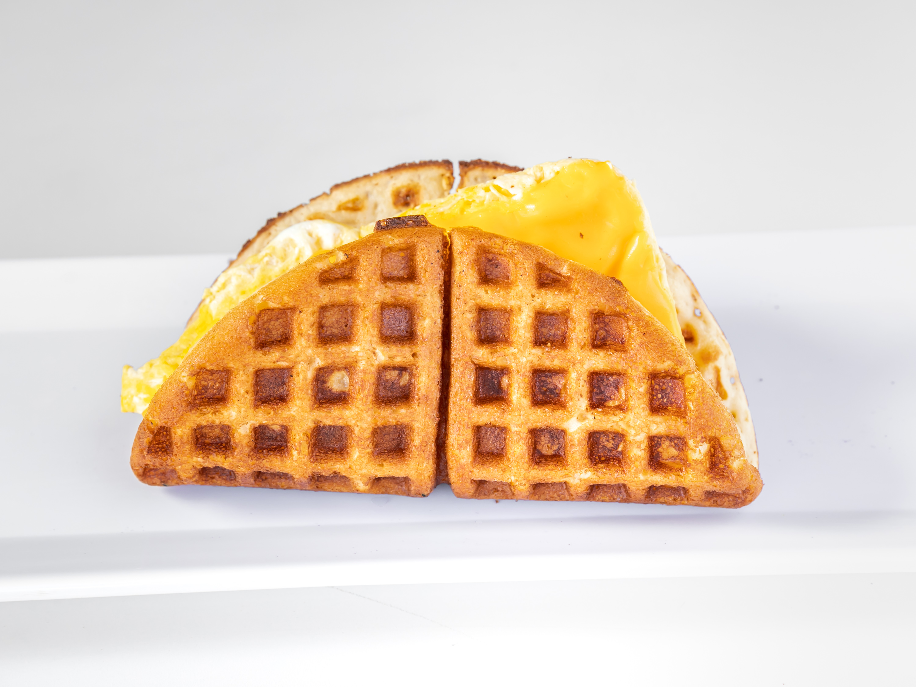 Order Egg and Cheese Waffle Sandwich food online from Famous Waffle Sandwich store, San Diego on bringmethat.com
