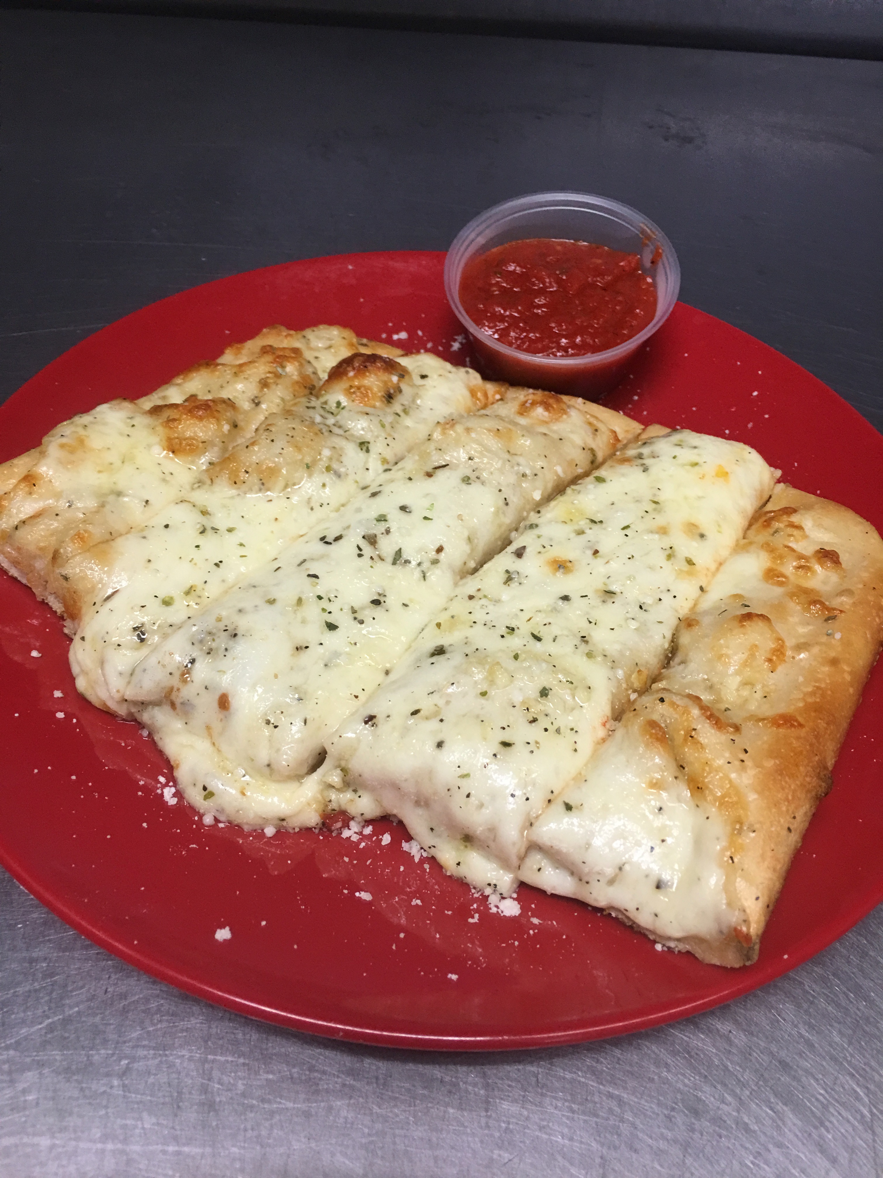 Order 4 Pieces Cheesy Bread Sticks food online from Panzano Pizzeria Trattoria store, Montclair on bringmethat.com