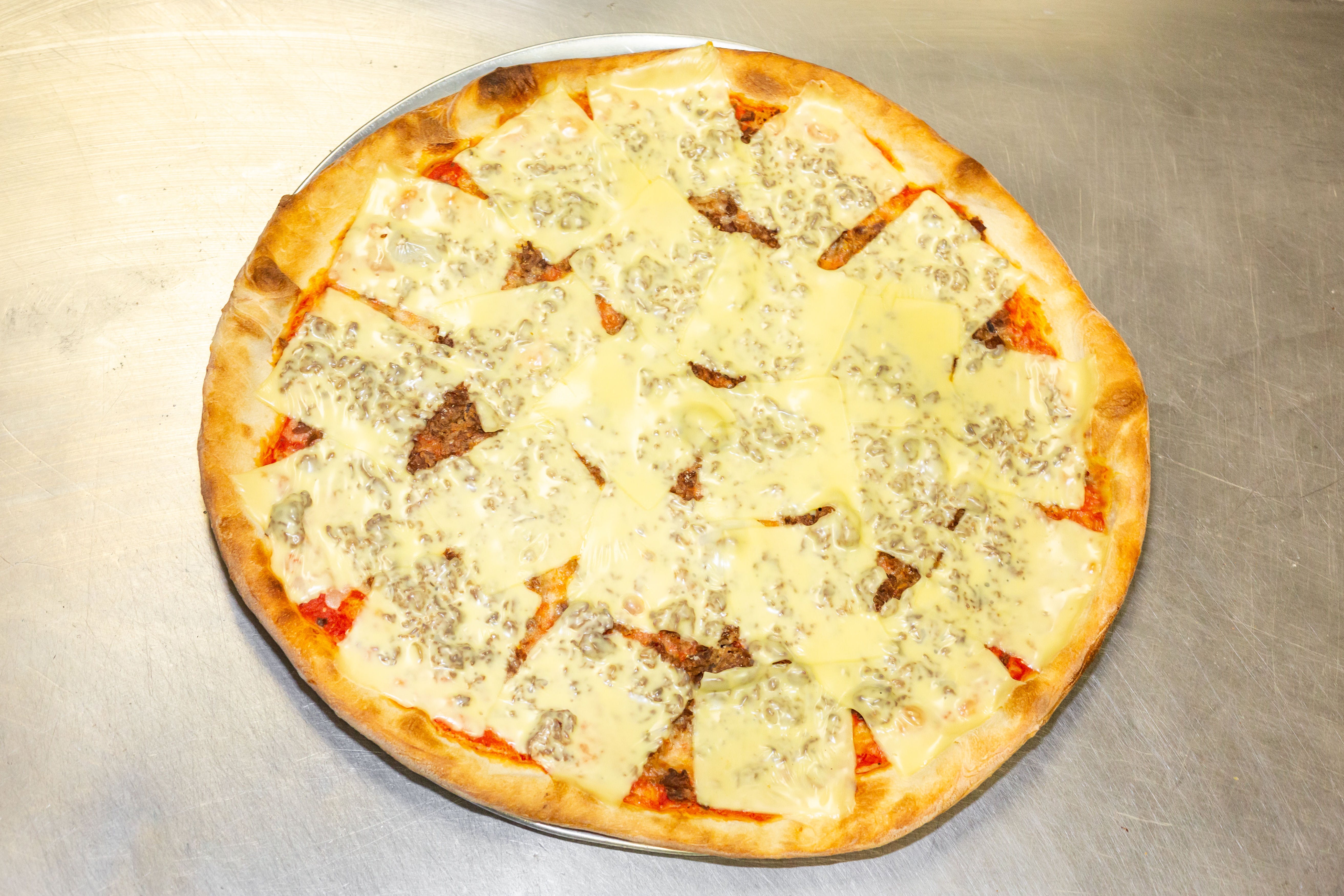 Order Philly Cheese Steak Pizza - Medium 14" food online from Amalfi Pizza store, Newark on bringmethat.com