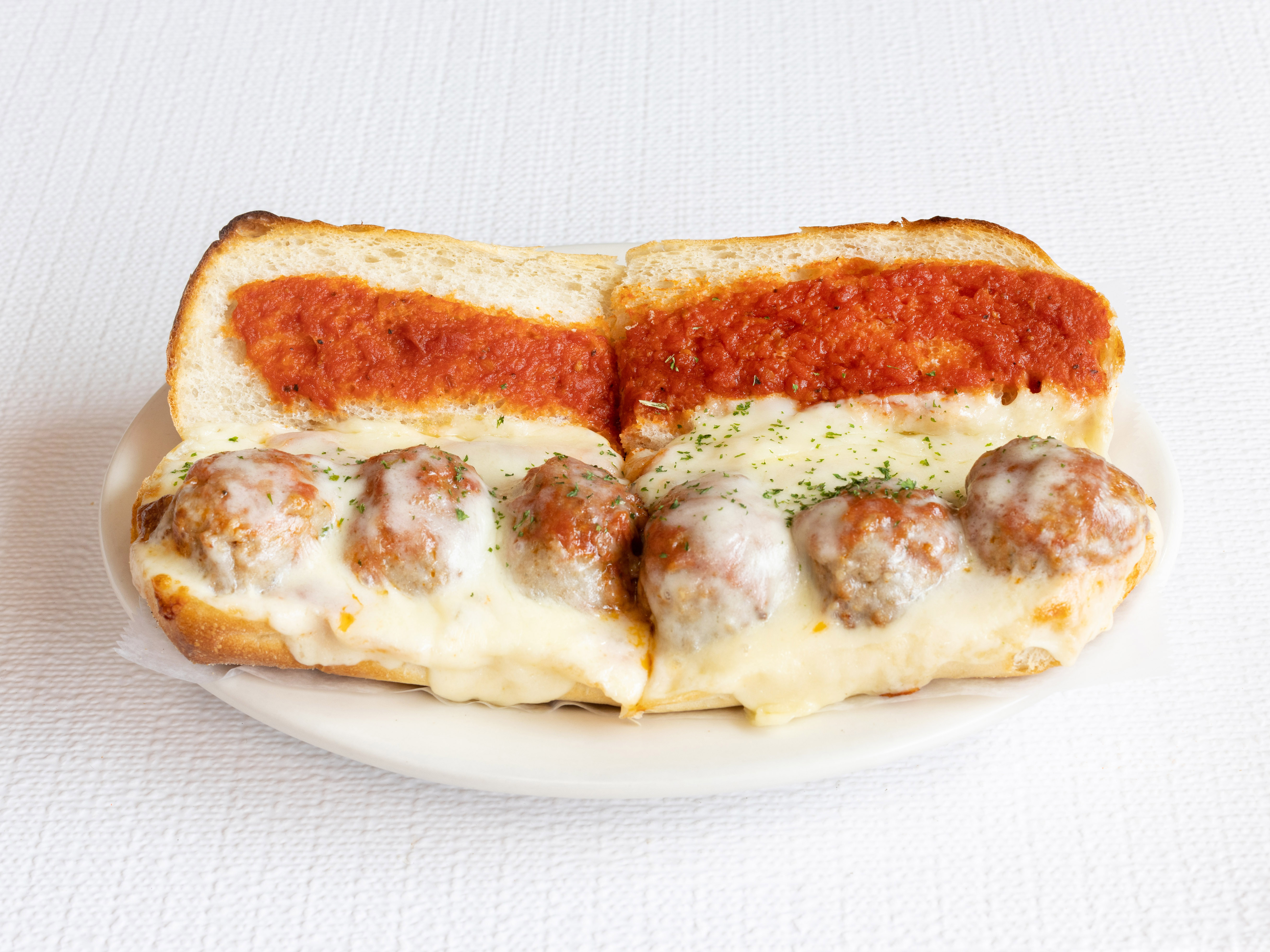 Order Meatball Parmigiana Sandwich food online from Georgio's Pizzeria store, Jersey City on bringmethat.com
