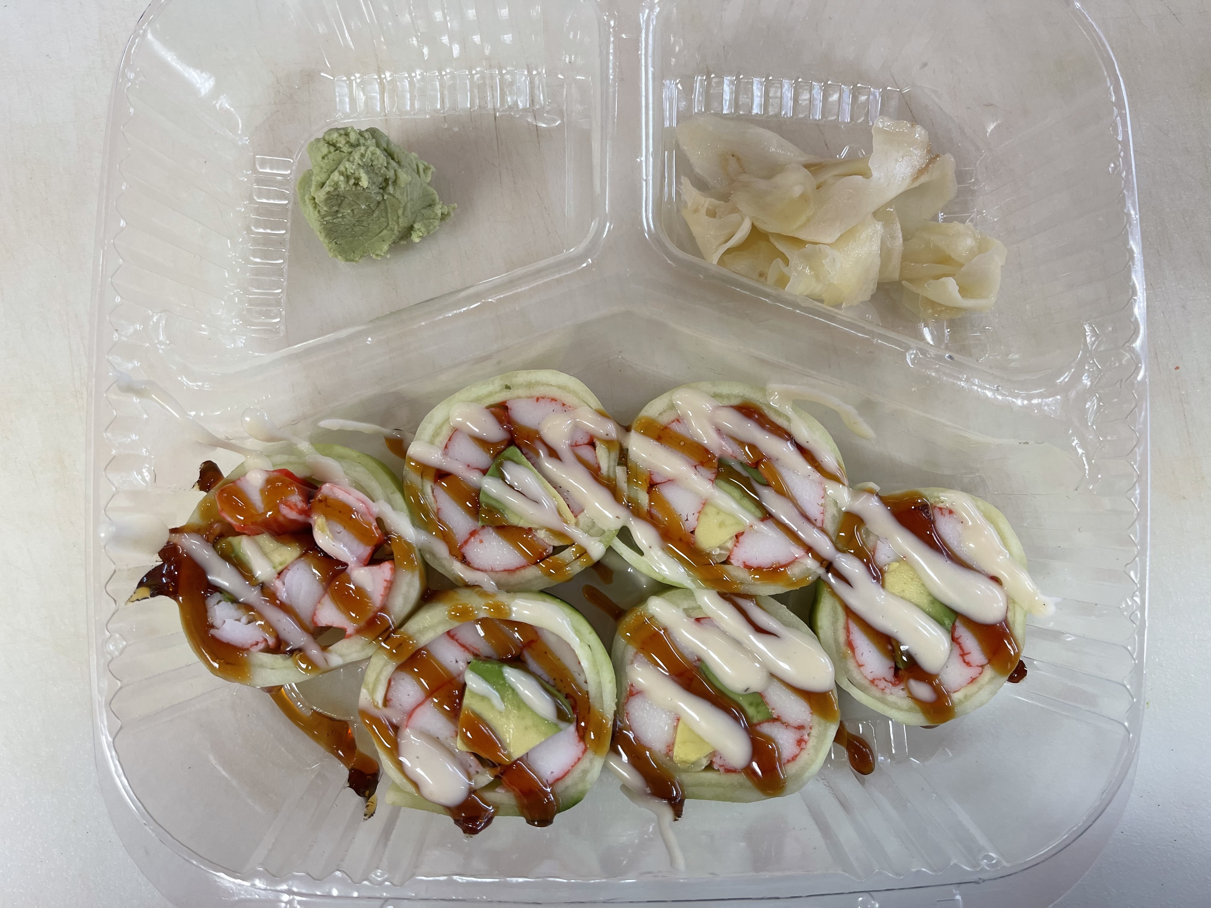 Order Kani Kama Roll food online from Sushi Go store, Dallas on bringmethat.com