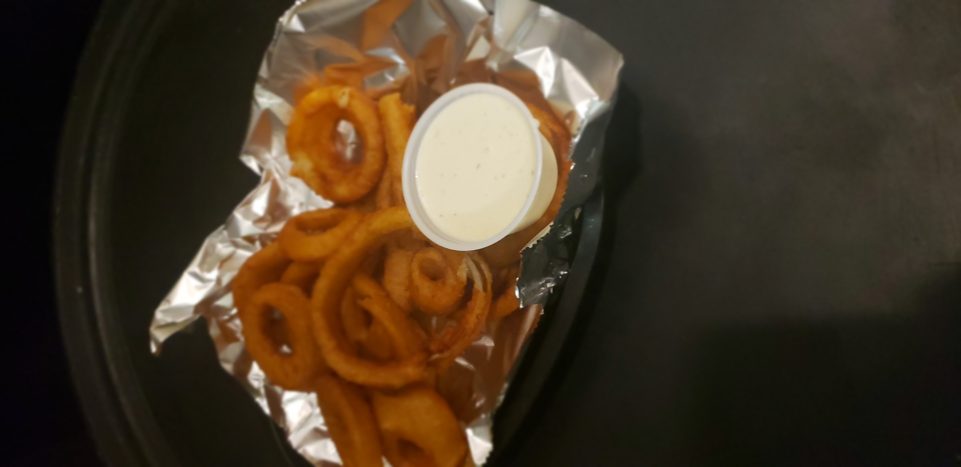 Order Bourbon Battered Onion Rings food online from The Loft store, Crete on bringmethat.com