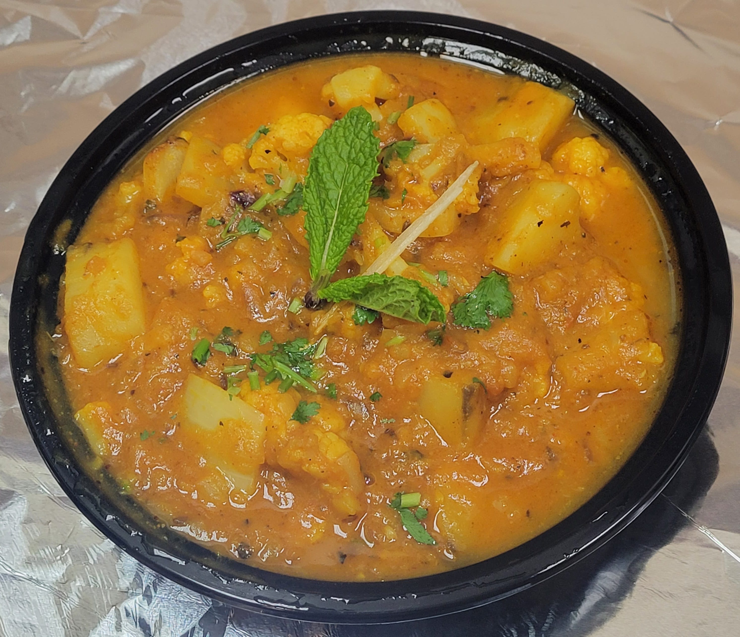 Order Aloo Gobi Masala  food online from Tropical Curry And Grill store, Pflugerville on bringmethat.com