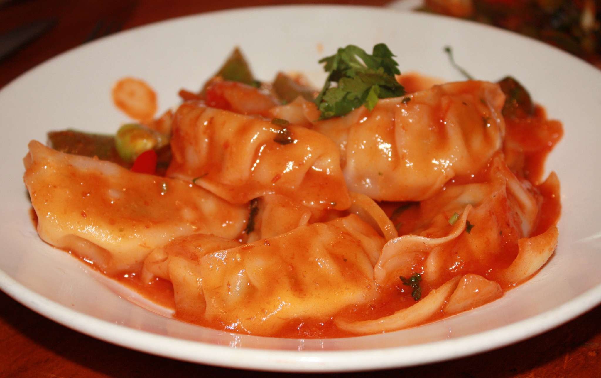 Order Chilli Chicken Momo food online from Swad Indian and Nepalese Cousine store, Fort Worth on bringmethat.com