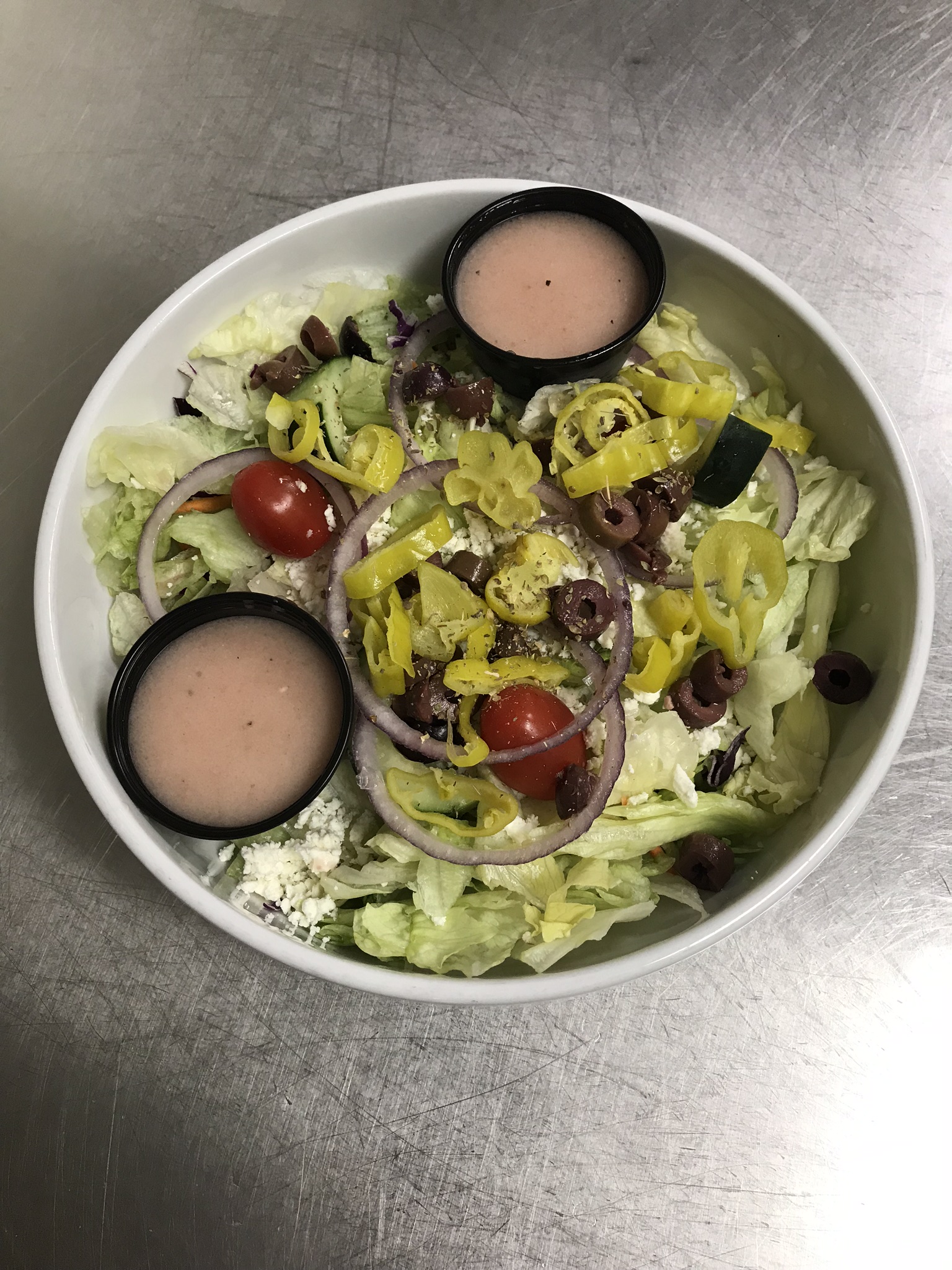 Order Greek Salad food online from On Tap Grille And Bar store, Cuyahoga Falls on bringmethat.com
