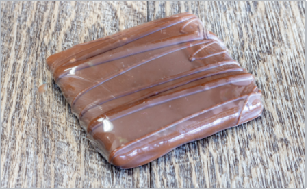 Order Dipped Graham Cracker -Milk Chocolate food online from Rocky Mountain Chocolate Factory store, Terrell on bringmethat.com