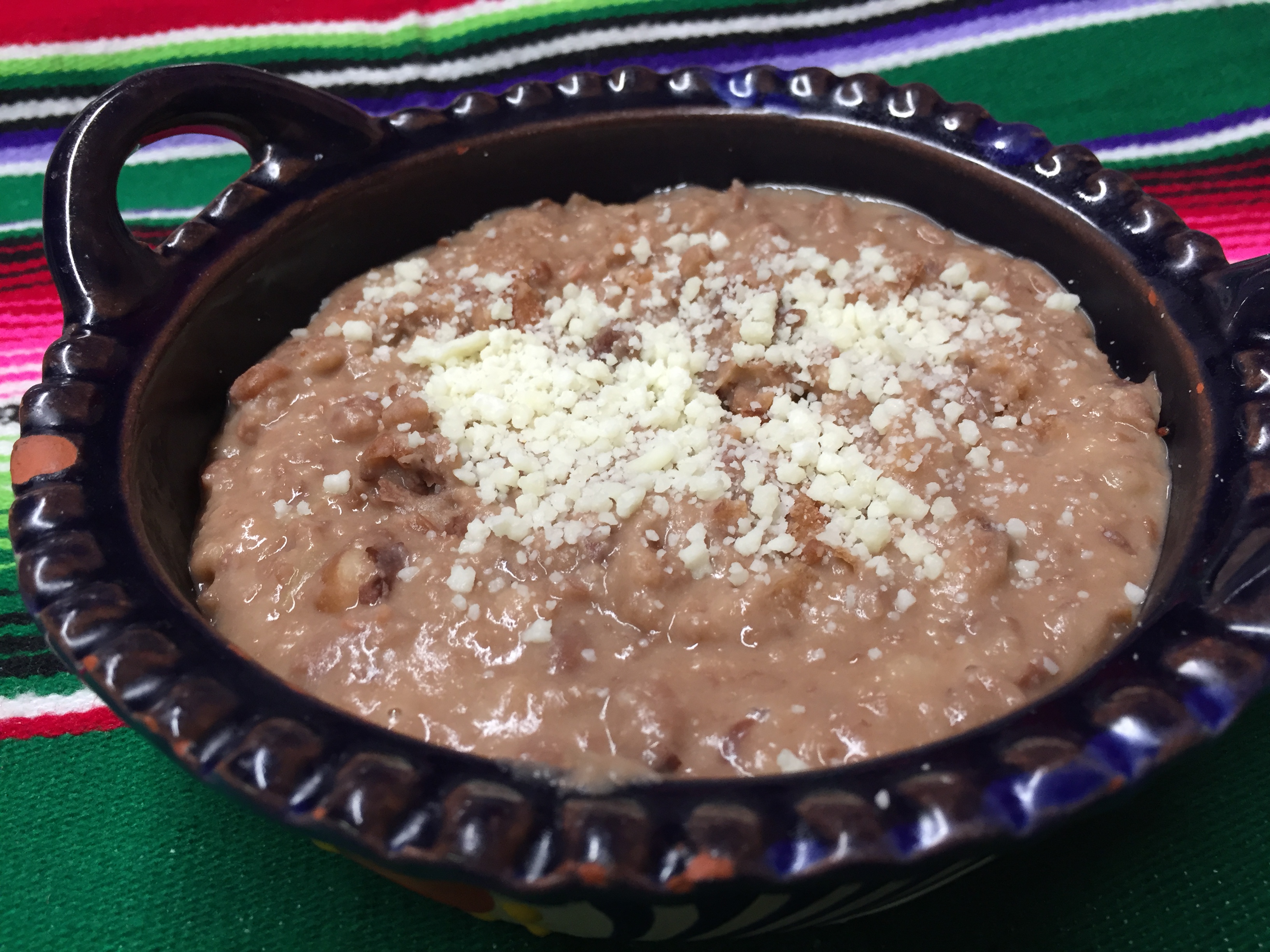 Order REFRIED BEANS  food online from Montes Cafe store, Seaside Heights on bringmethat.com