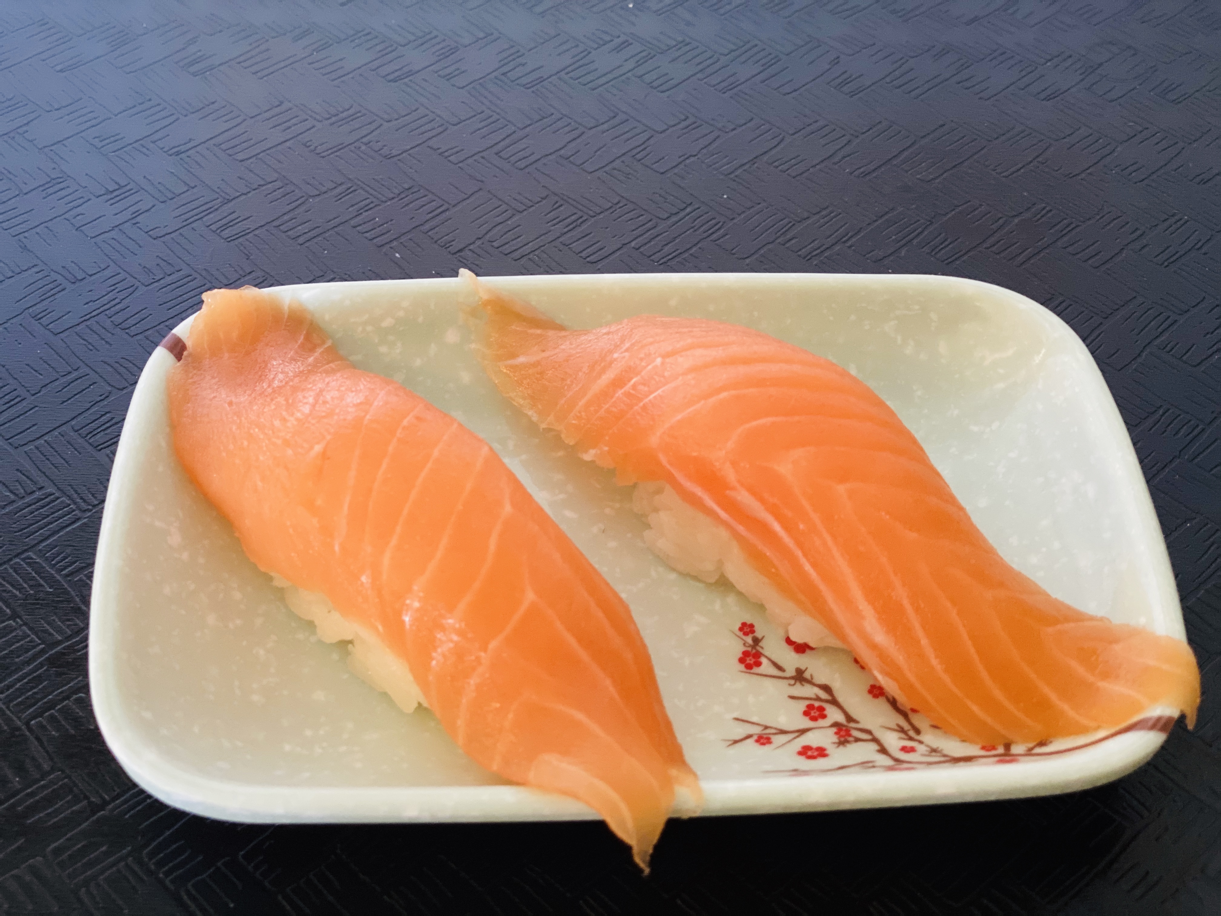 Order 45. Sake Nigiri 三文鱼贴面 food online from Tengu Sushi store, Newport on bringmethat.com