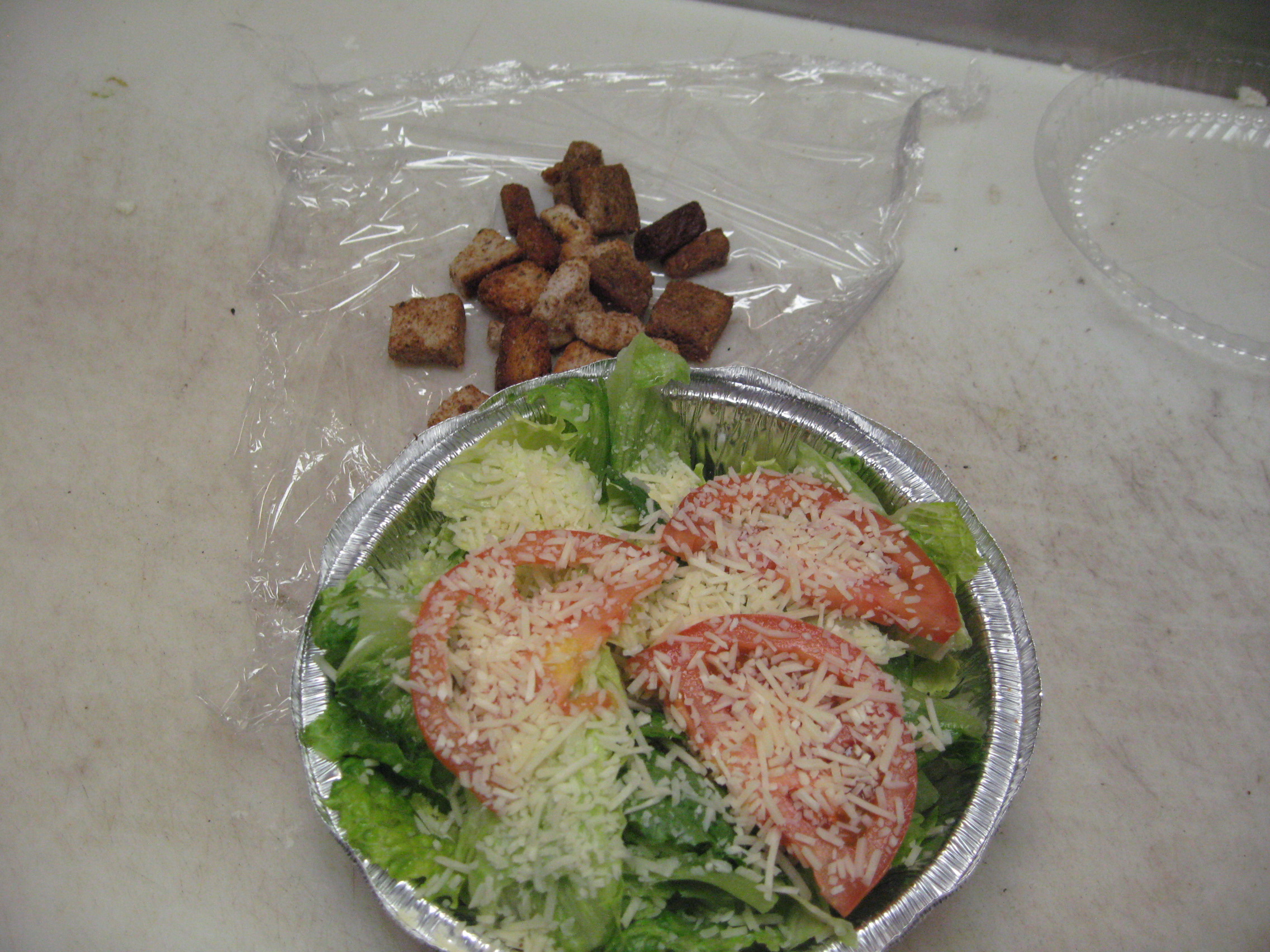 Order Caesar Salad food online from Papas Pizza store, San Diego on bringmethat.com