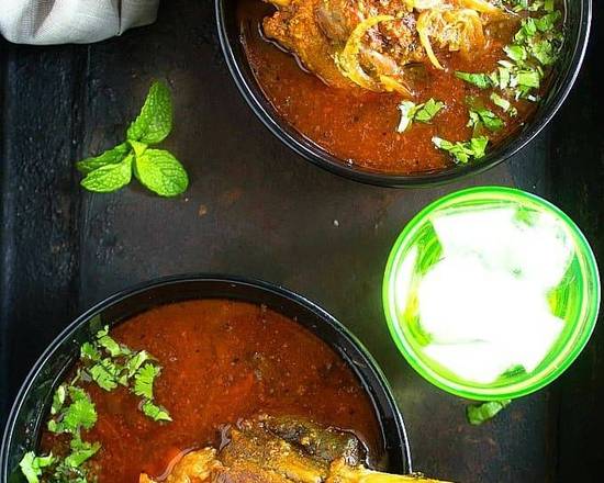 Order Lamb Shank Curry food online from Namaste Indian Cuisine store, Portland on bringmethat.com