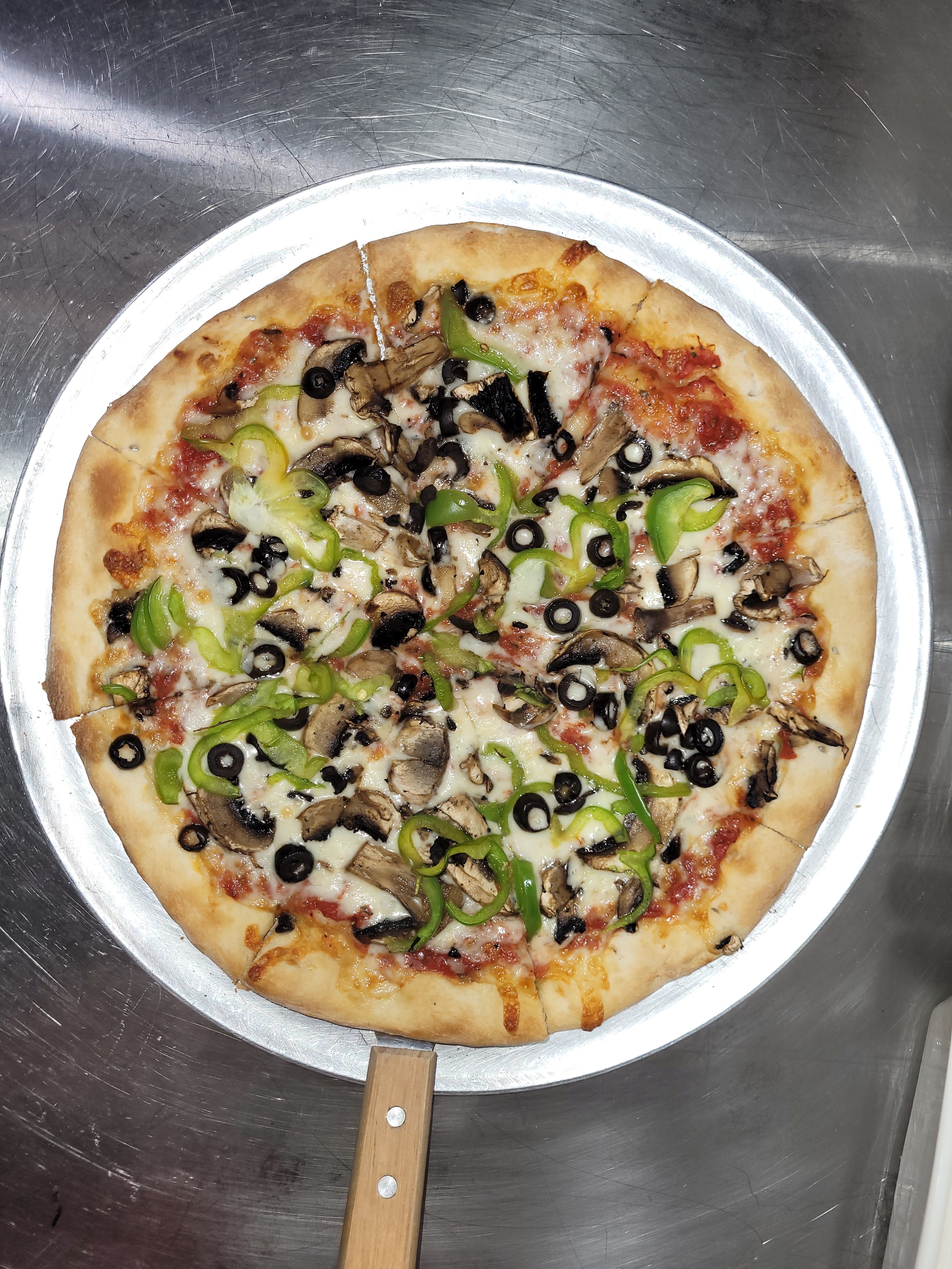 Order Veggie Pizza - 12'' food online from Mony Pizzeria store, Houston on bringmethat.com
