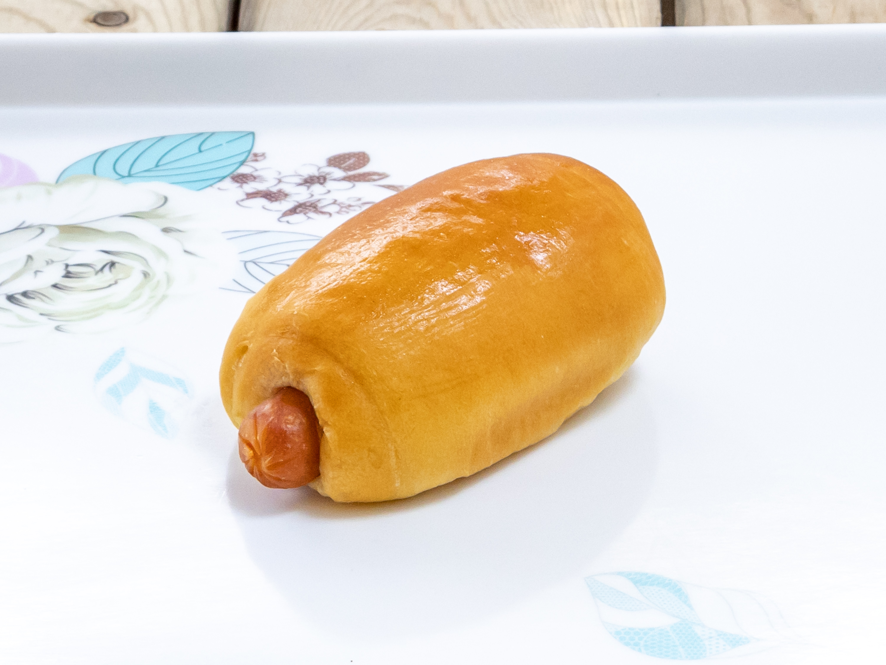 Order Small Sausage Roll food online from Cotton Candy Donuts store, Dallas on bringmethat.com