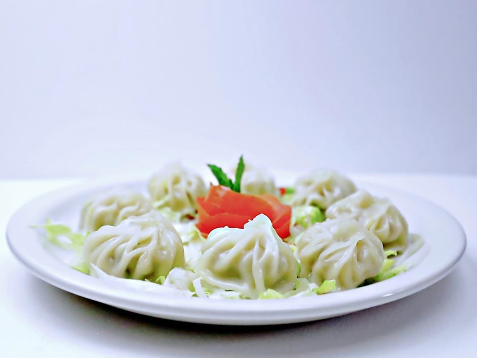 Order Chicken Momo food online from Namaste Chicago store, Chicago on bringmethat.com
